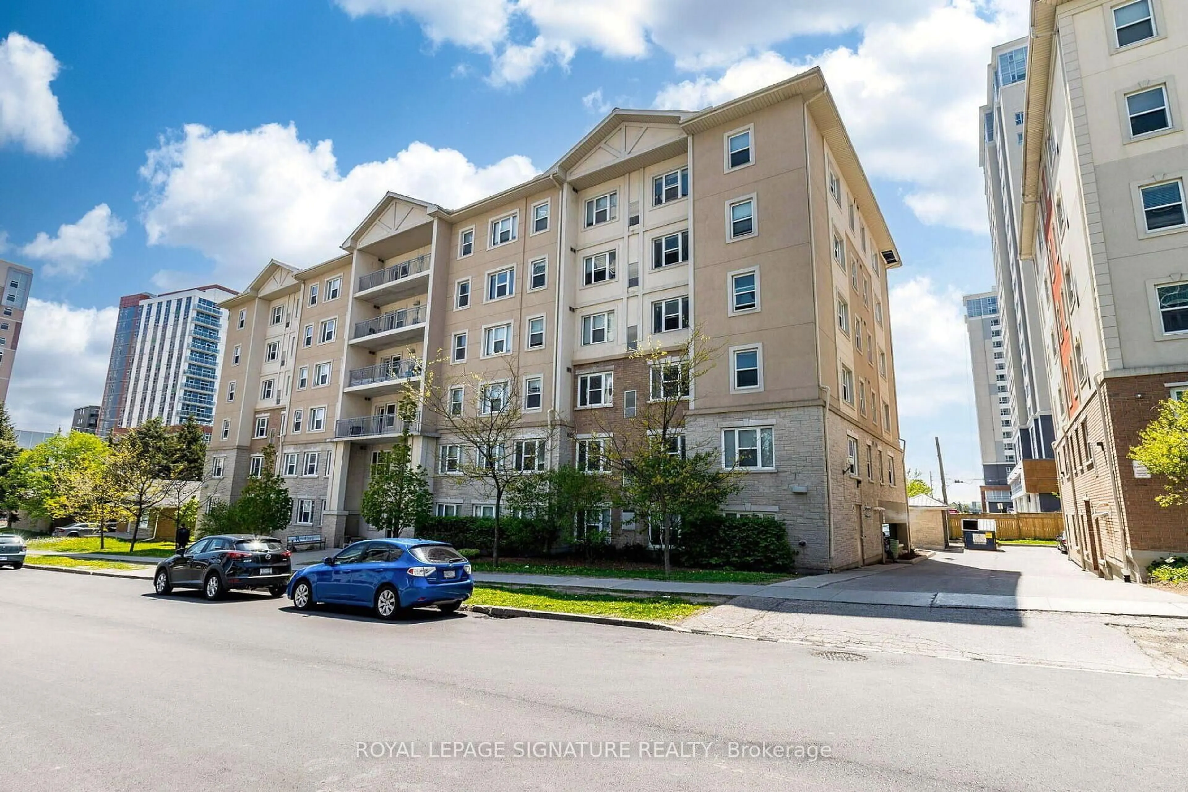 A pic from outside/outdoor area/front of a property/back of a property/a pic from drone, building for 251 Lester St #401, Waterloo Ontario N2L 3W6