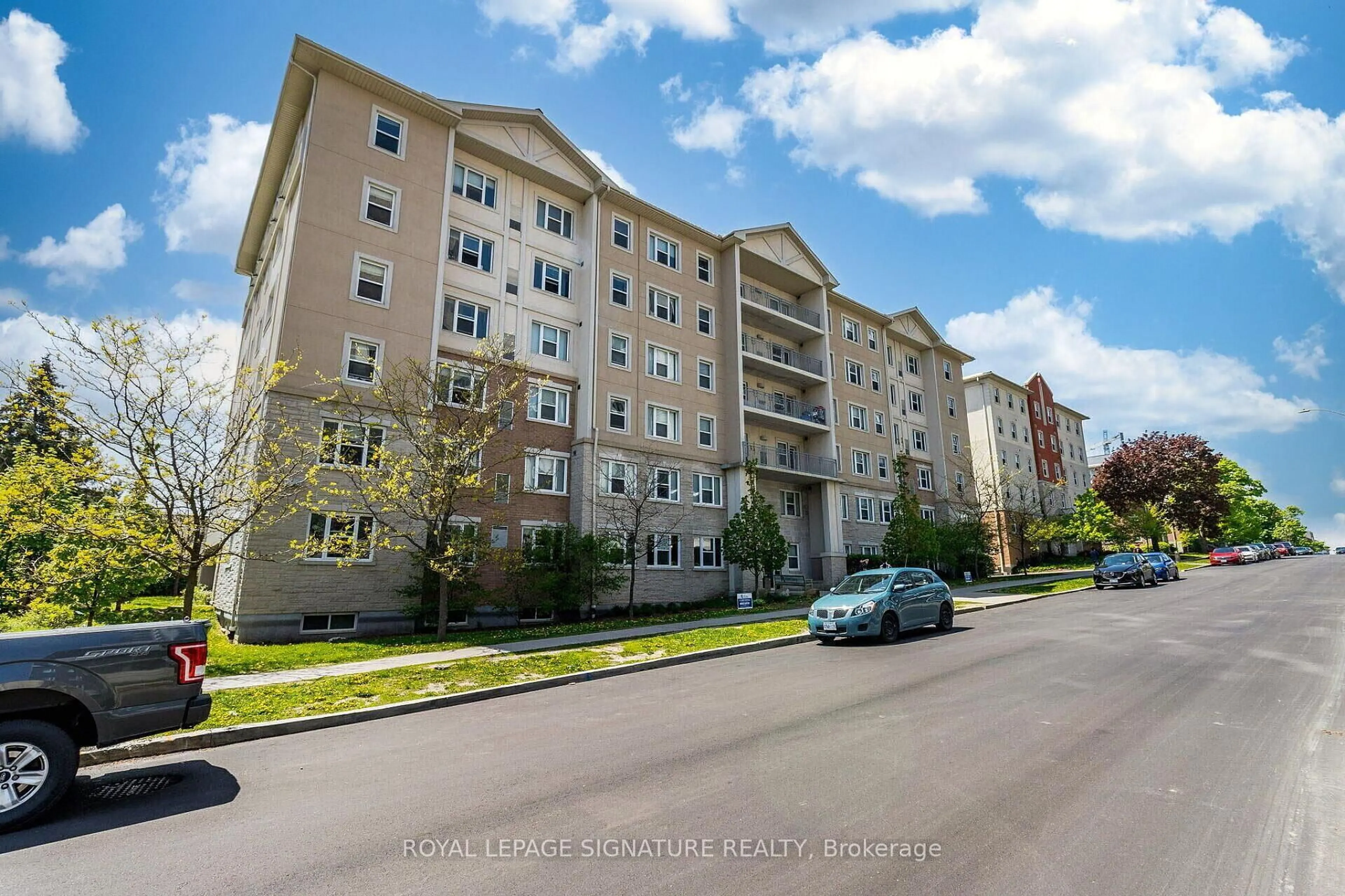 A pic from outside/outdoor area/front of a property/back of a property/a pic from drone, street for 251 Lester St #401, Waterloo Ontario N2L 3W6