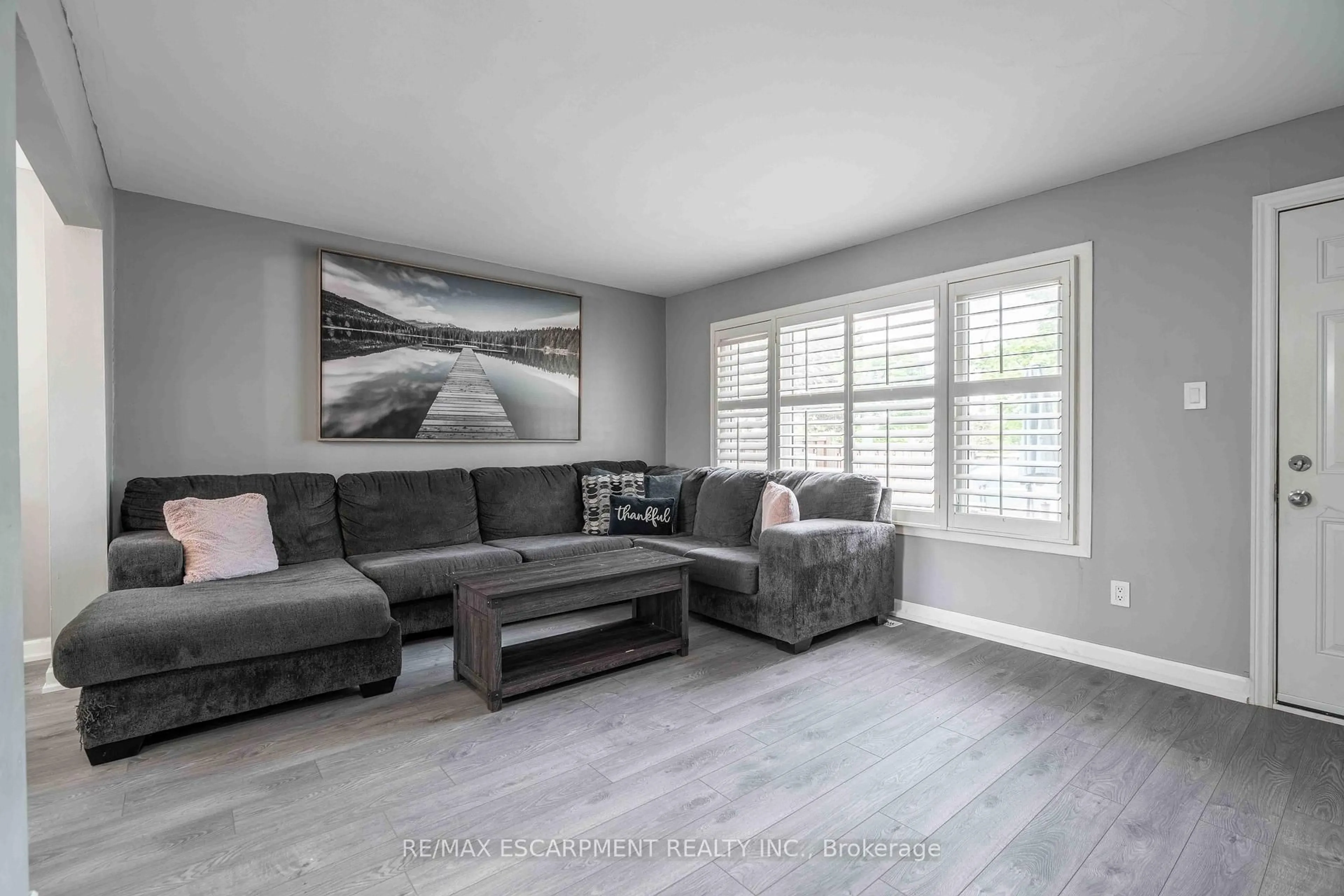 Living room with furniture, unknown for 1025 Upper Gage Ave #1, Hamilton Ontario L8V 4L2