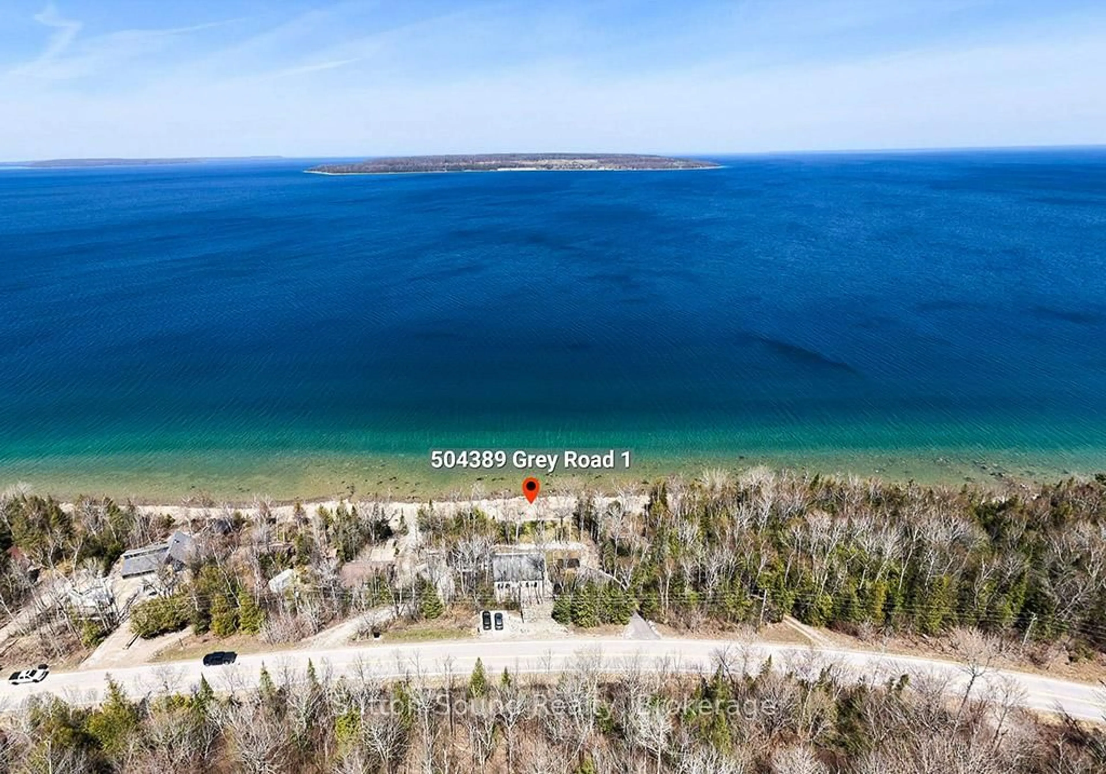 A pic from outside/outdoor area/front of a property/back of a property/a pic from drone, water/lake/river/ocean view for 504389 GREY ROAD 1, Georgian Bluffs Ontario N0H 2T0