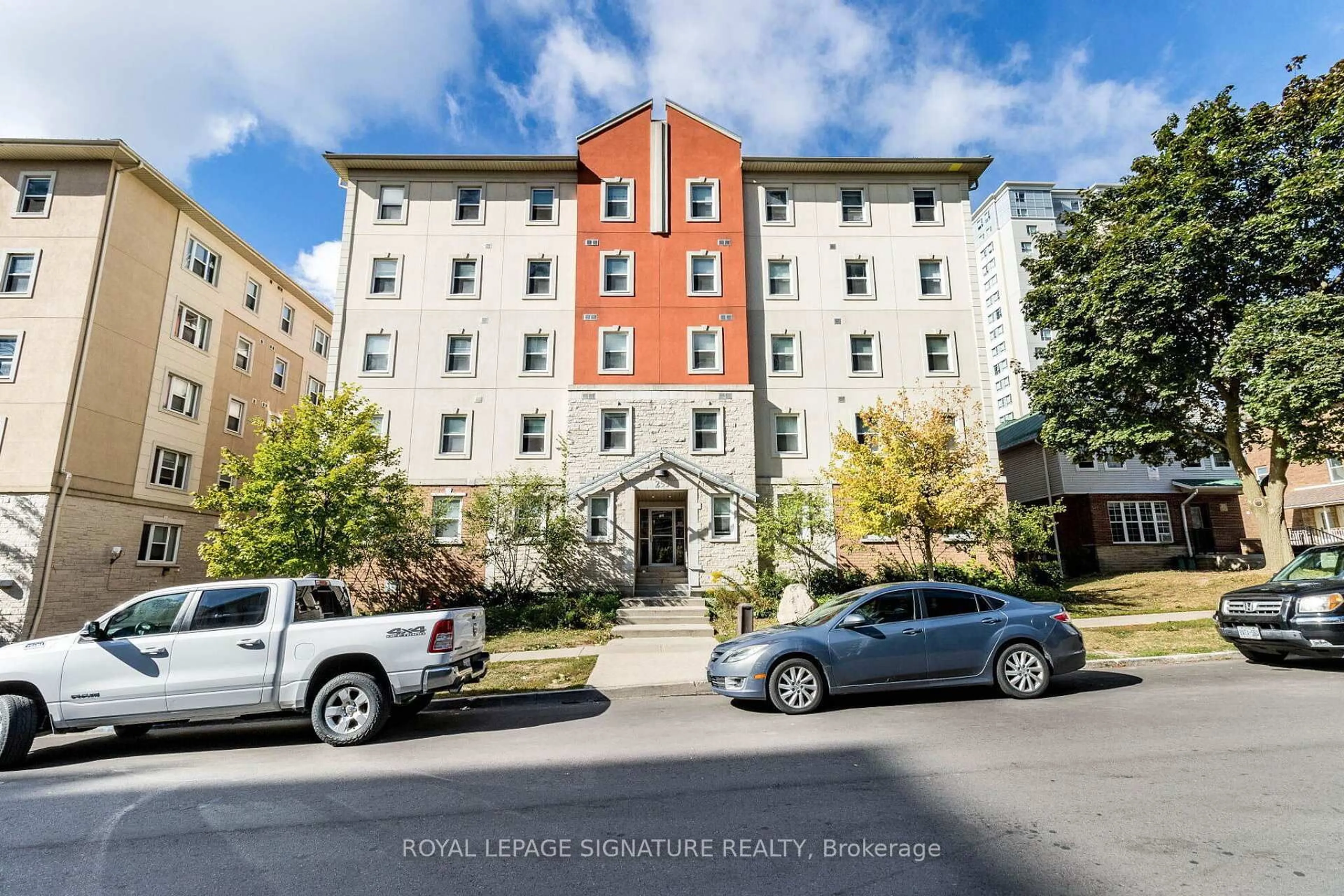 A pic from outside/outdoor area/front of a property/back of a property/a pic from drone, building for 253 Lester St #203, Waterloo Ontario N2L 3W6