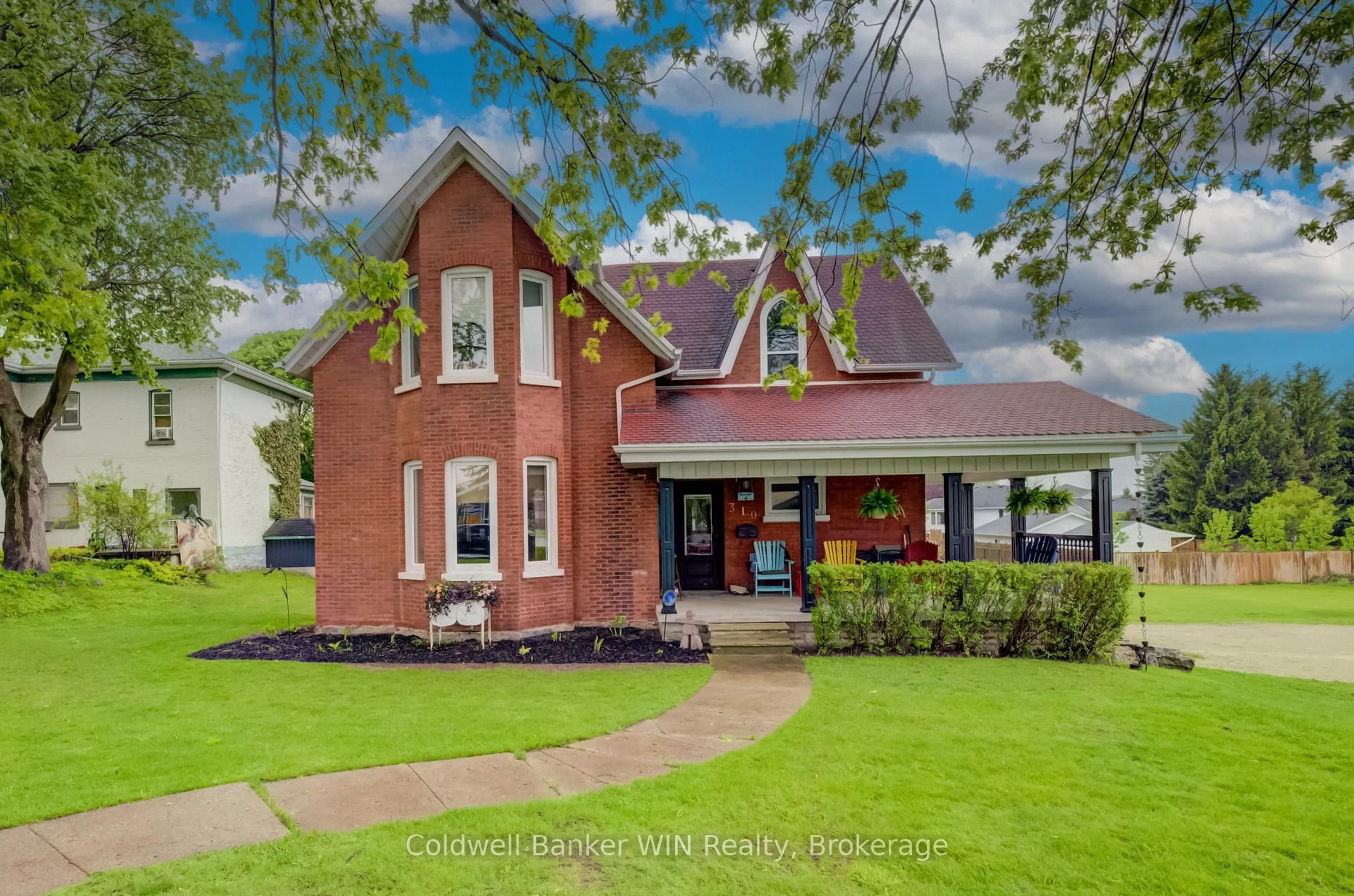 Home with brick exterior material, street for 310 Main St, Minto Ontario N0G 2P0