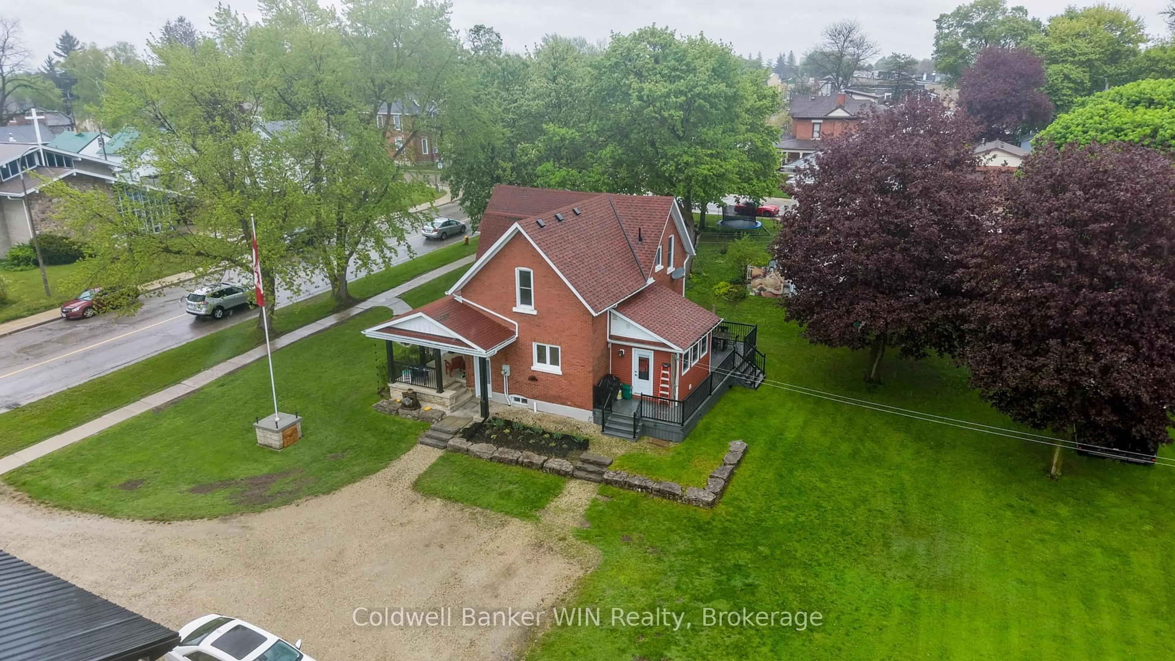 A pic from outside/outdoor area/front of a property/back of a property/a pic from drone, street for 310 Main St, Minto Ontario N0G 2P0