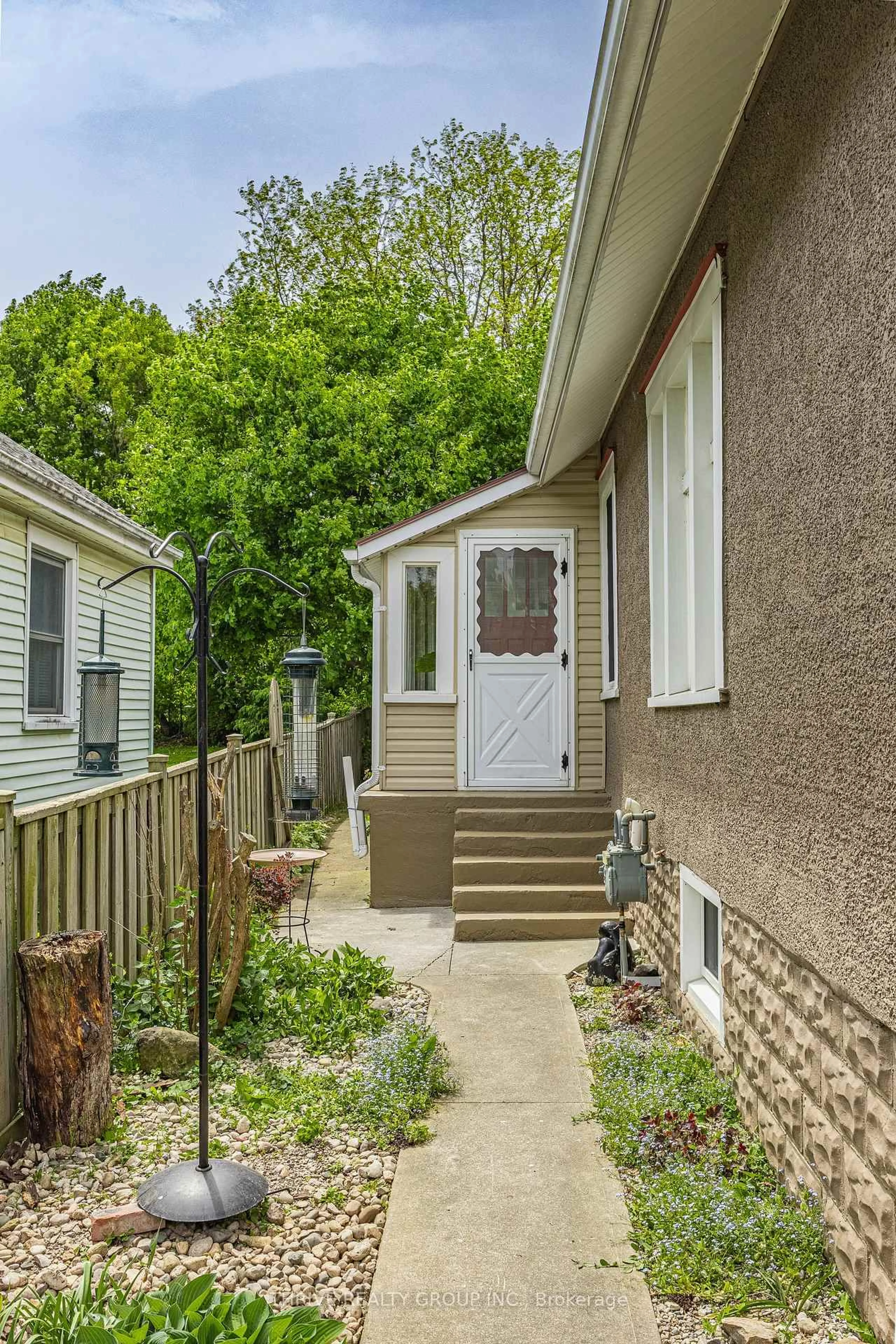 Home with vinyl exterior material, street for 111 Alexandra St, London South Ontario N6C 2B3