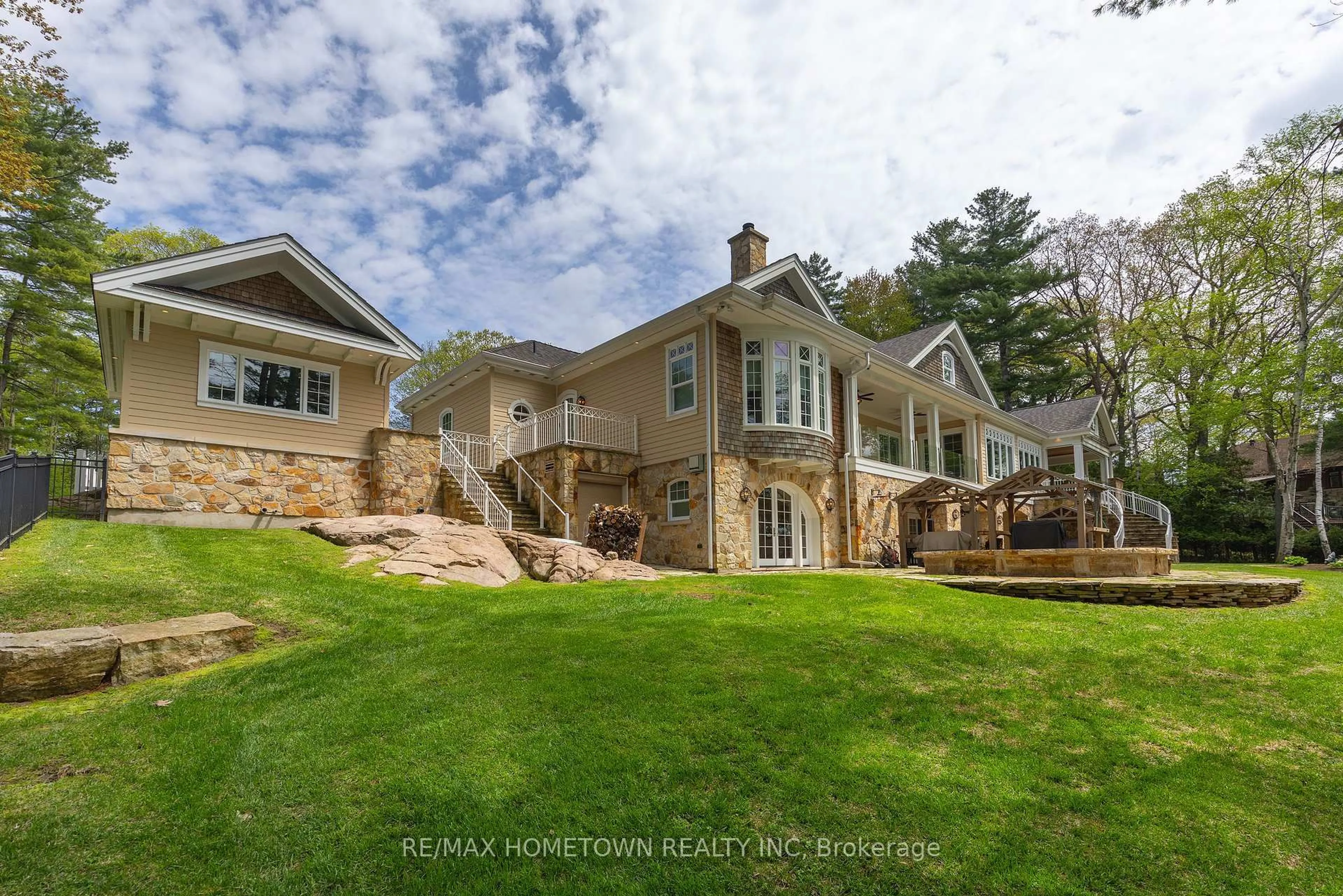 A pic from outside/outdoor area/front of a property/back of a property/a pic from drone, water/lake/river/ocean view for 11 Riverview Dr, Leeds and the Thousand Islands Ontario K0E 1V0