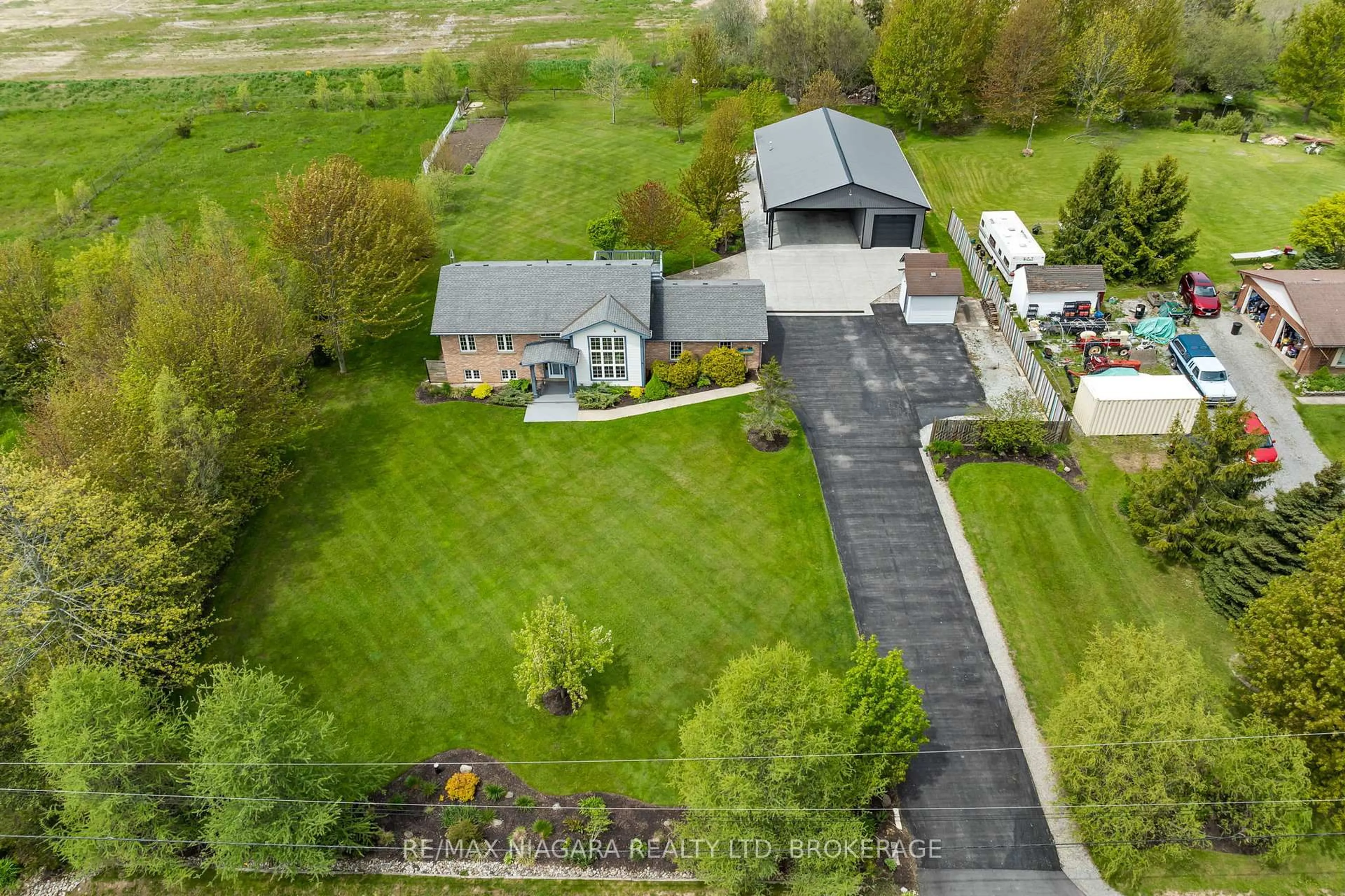 A pic from outside/outdoor area/front of a property/back of a property/a pic from drone, unknown for 11660 Belleview Beach Rd, Wainfleet Ontario L0S 1V0
