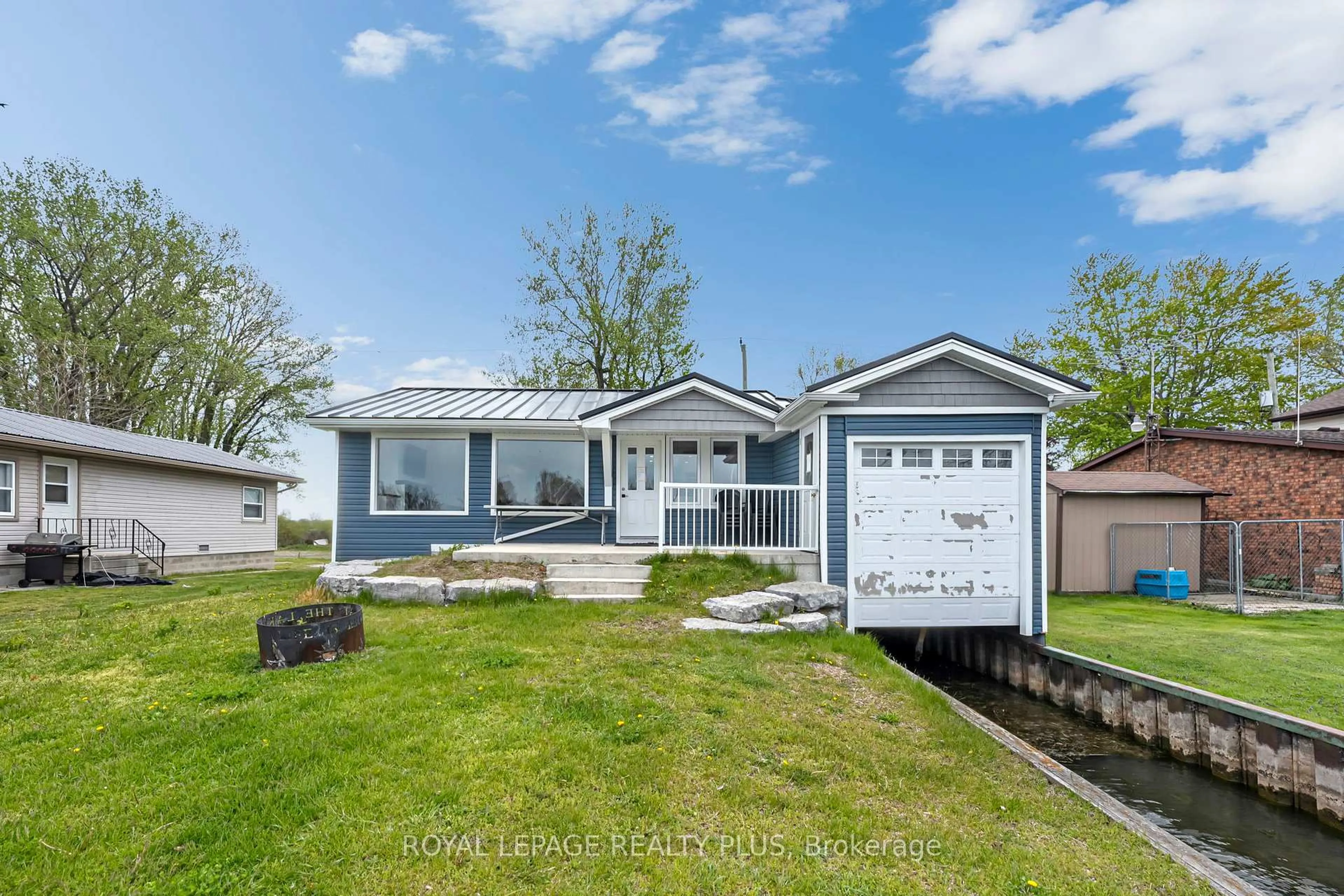 Home with vinyl exterior material, street for 36 Dickinson Ave, Norfolk Ontario N0E 1M0