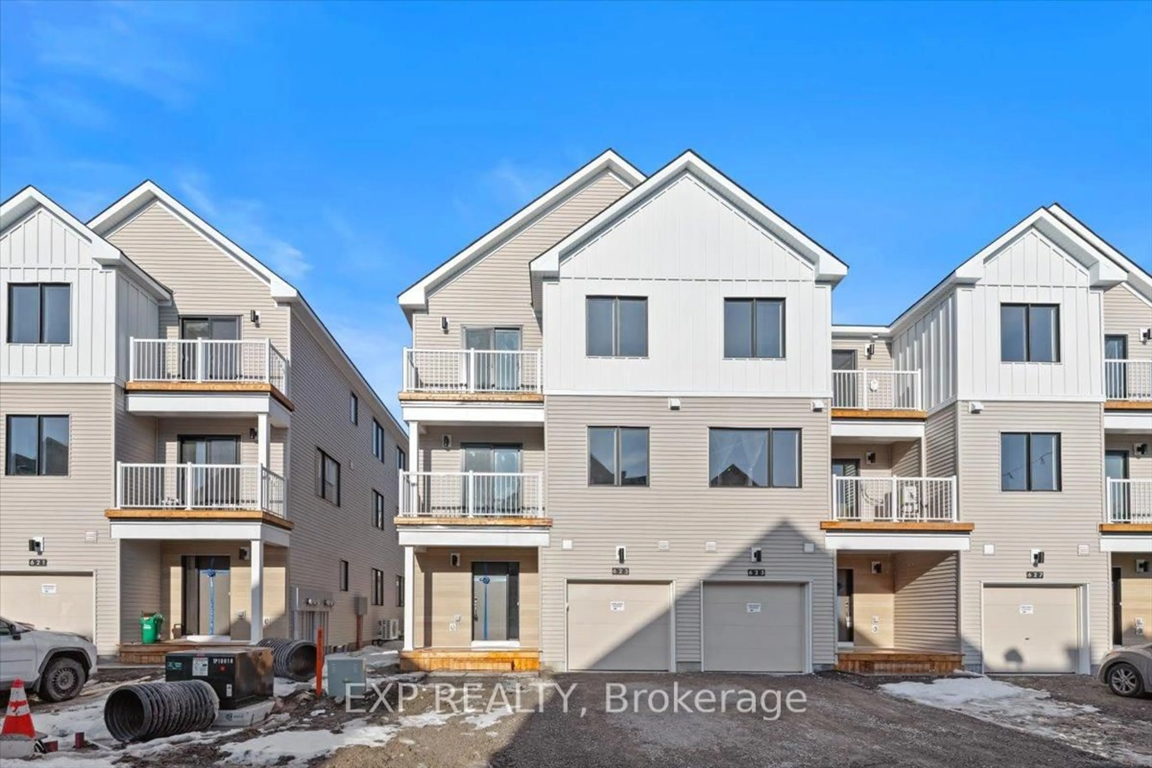 A pic from outside/outdoor area/front of a property/back of a property/a pic from drone, street for 314 John Kim Bell Private, Ottawa Ontario K1K 5C2