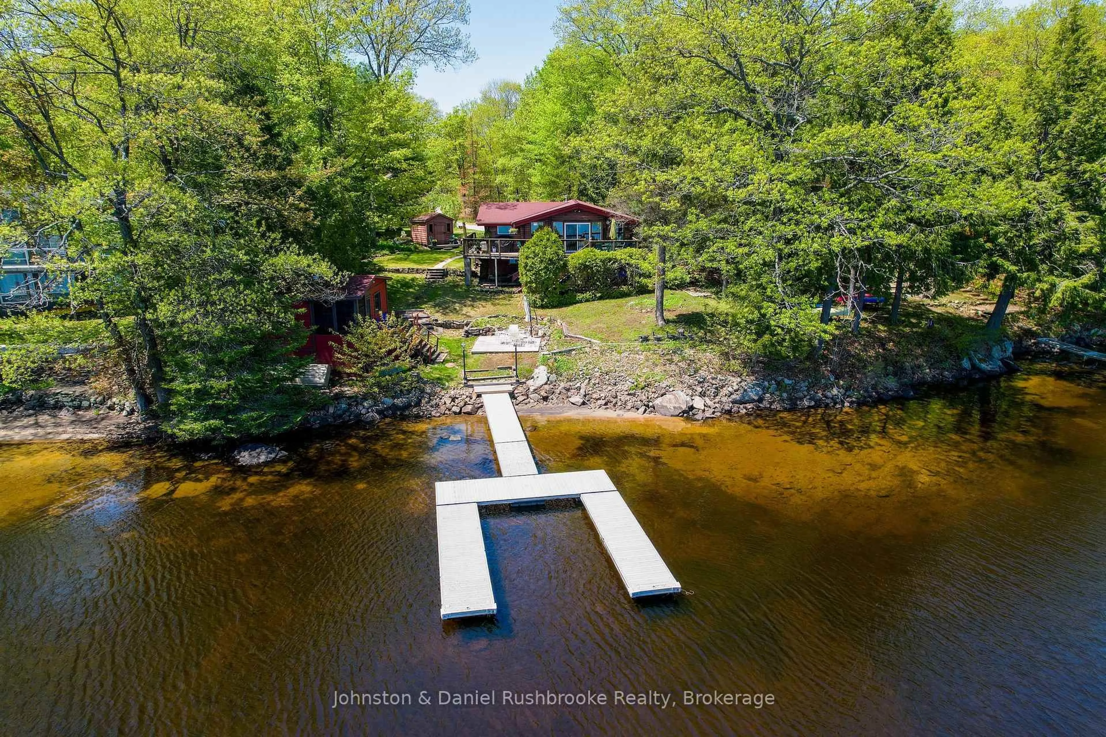 A pic from outside/outdoor area/front of a property/back of a property/a pic from drone, water/lake/river/ocean view for 1103 N Morrison Lake Rd, Gravenhurst Ontario P0E 1G0