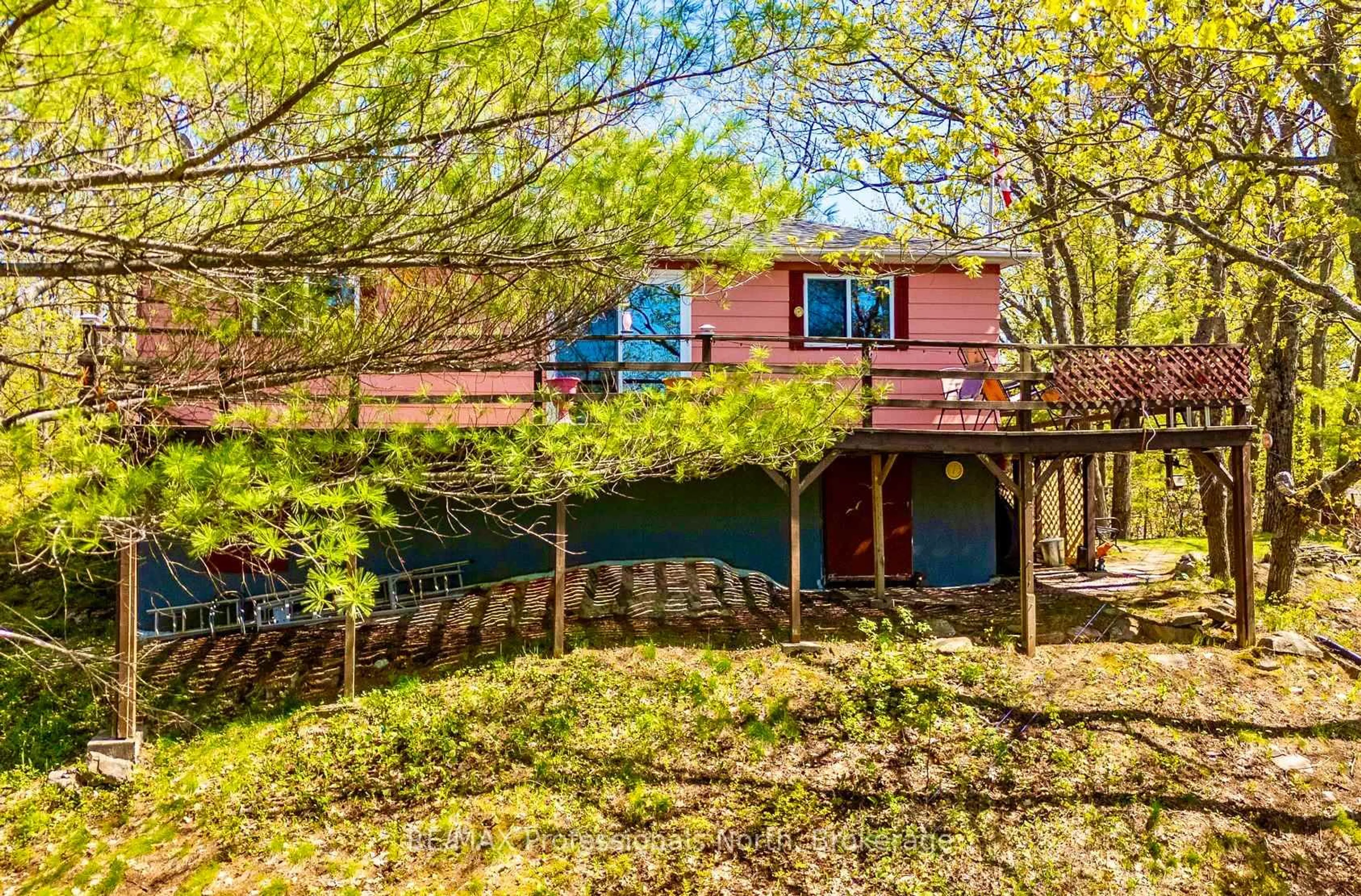 A pic from outside/outdoor area/front of a property/back of a property/a pic from drone, unknown for 1011 Palomino Tr, Minden Hills Ontario K0M 2K0