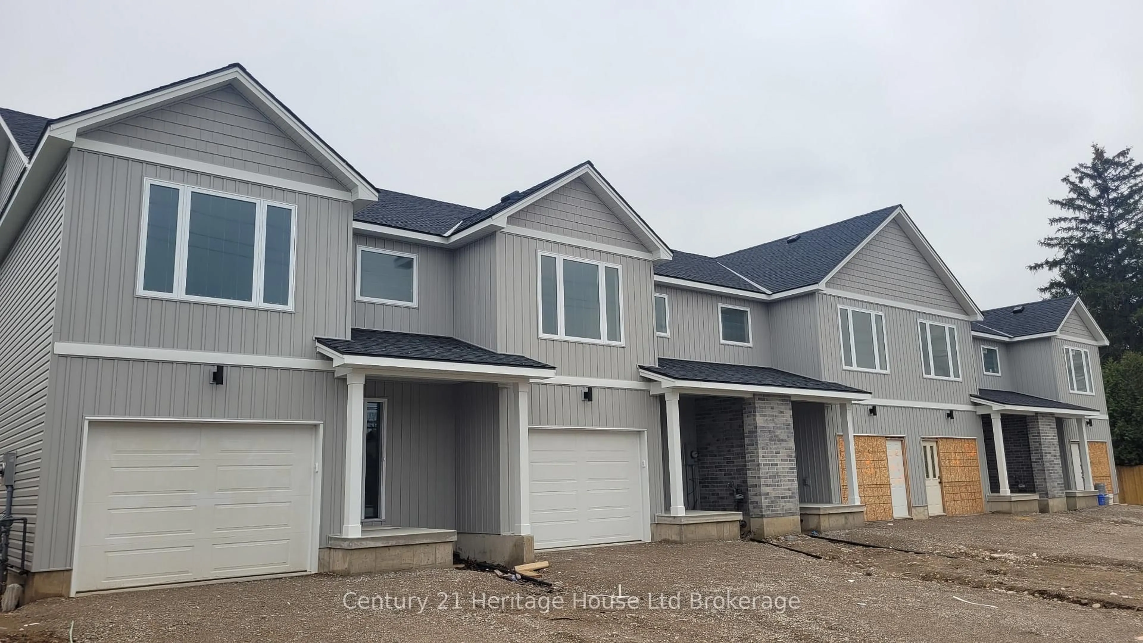 Home with vinyl exterior material, street for 54 Park Row, Woodstock Ontario N4S 1V8