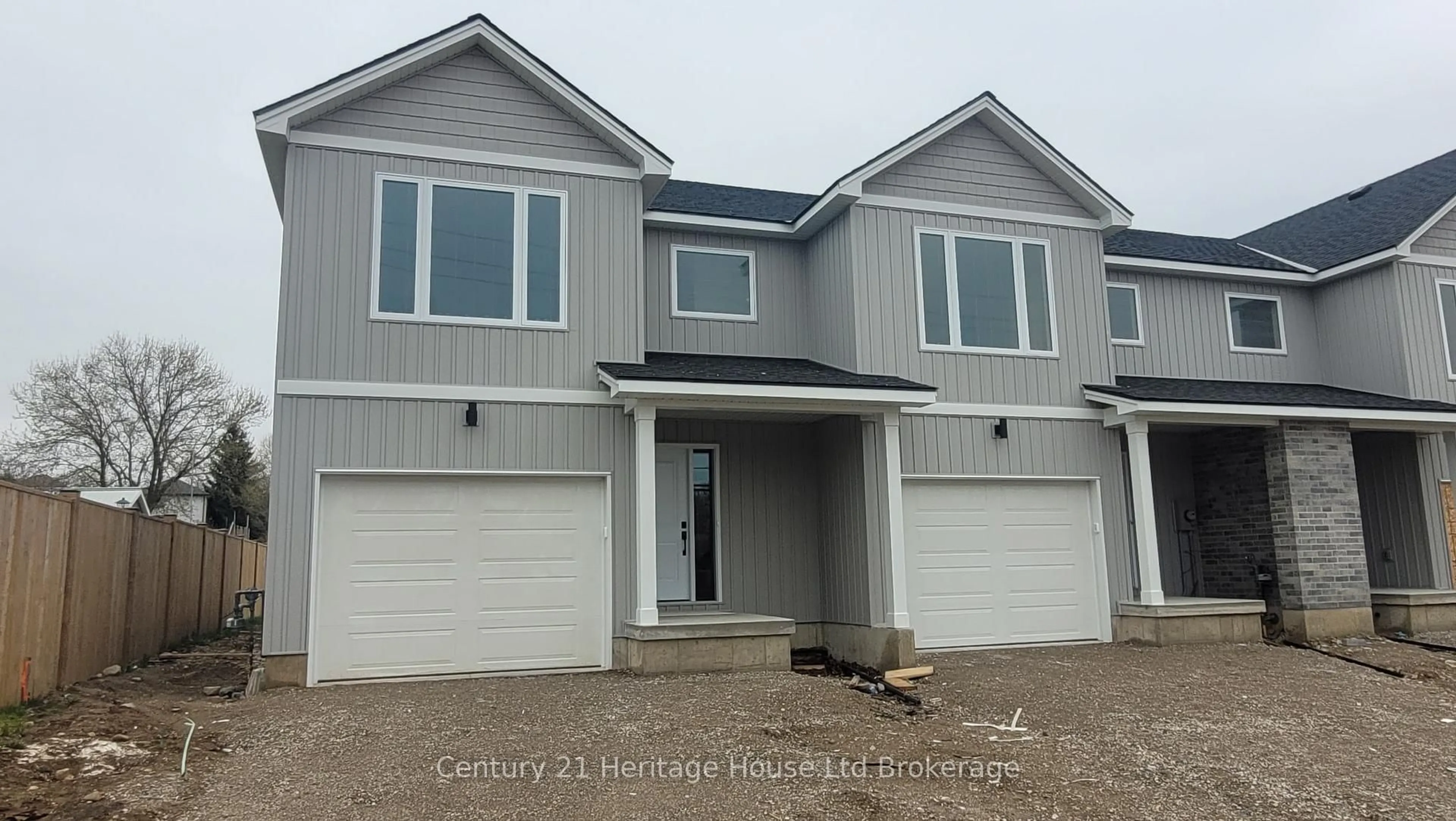 Home with vinyl exterior material, street for 54 Park Row, Woodstock Ontario N4S 1V8
