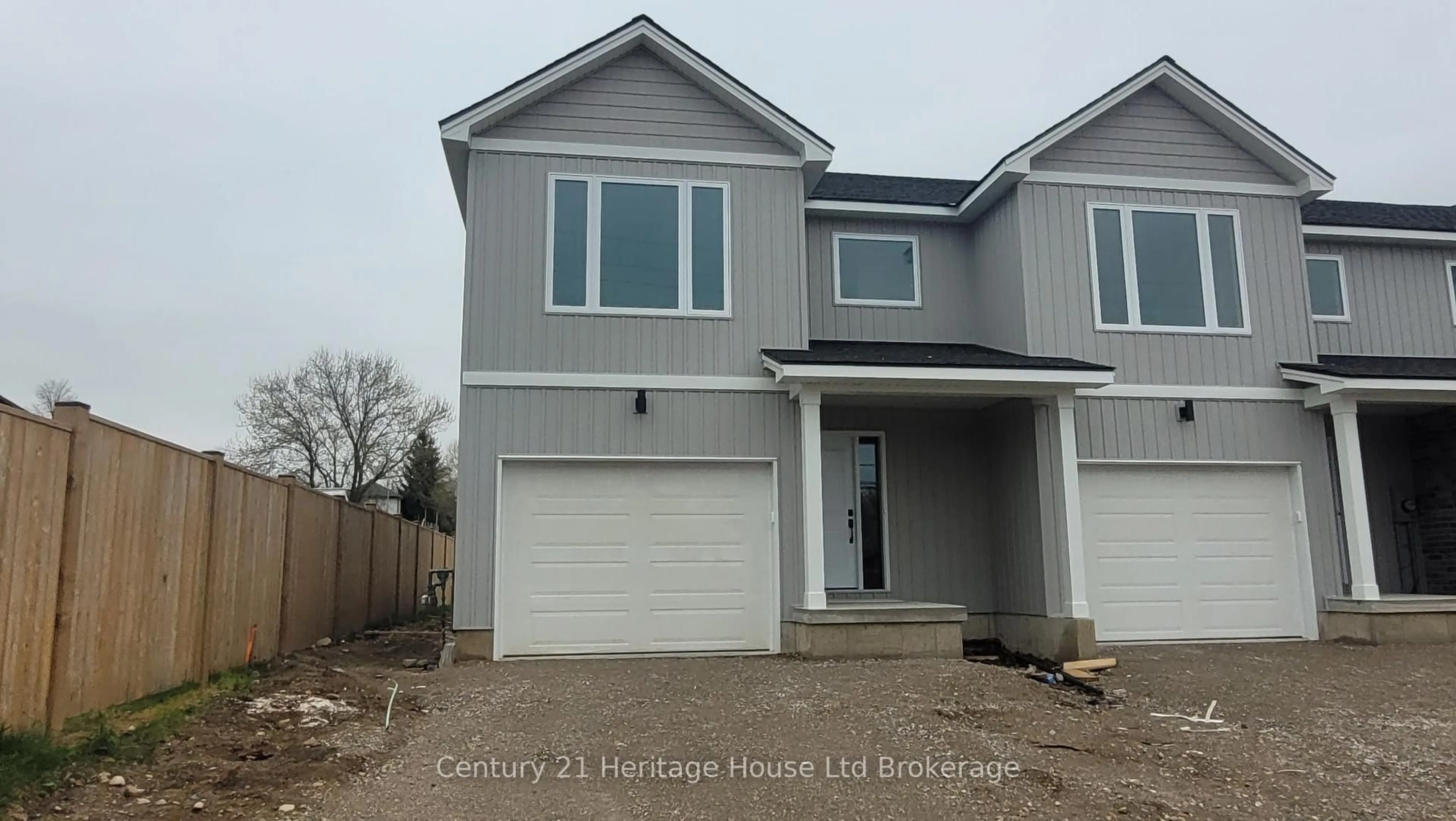 Home with vinyl exterior material, street for 54 Park Row, Woodstock Ontario N4S 1V8