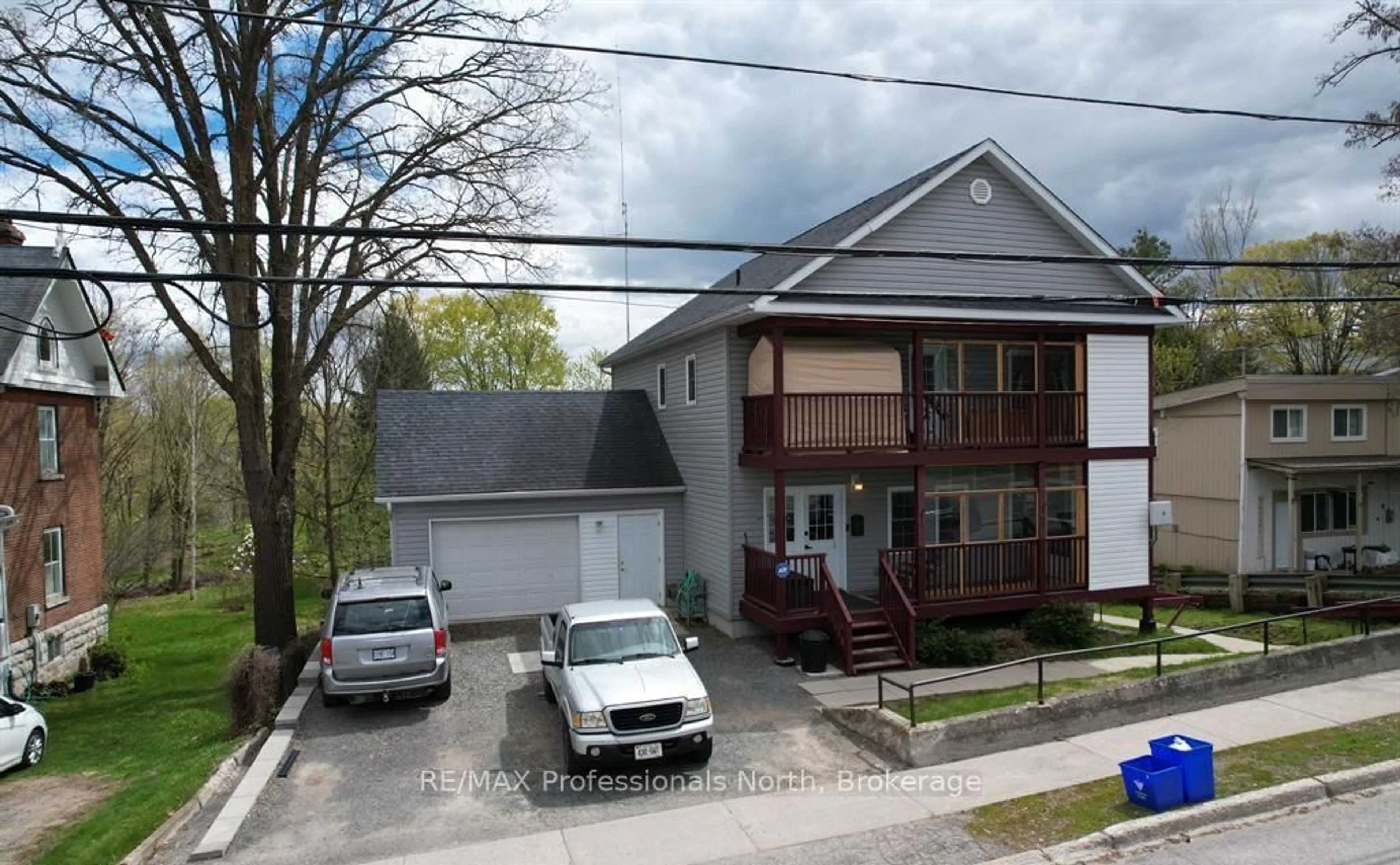 A pic from outside/outdoor area/front of a property/back of a property/a pic from drone, street for 103 St Lawrence St, Madoc Ontario K0K 2K0