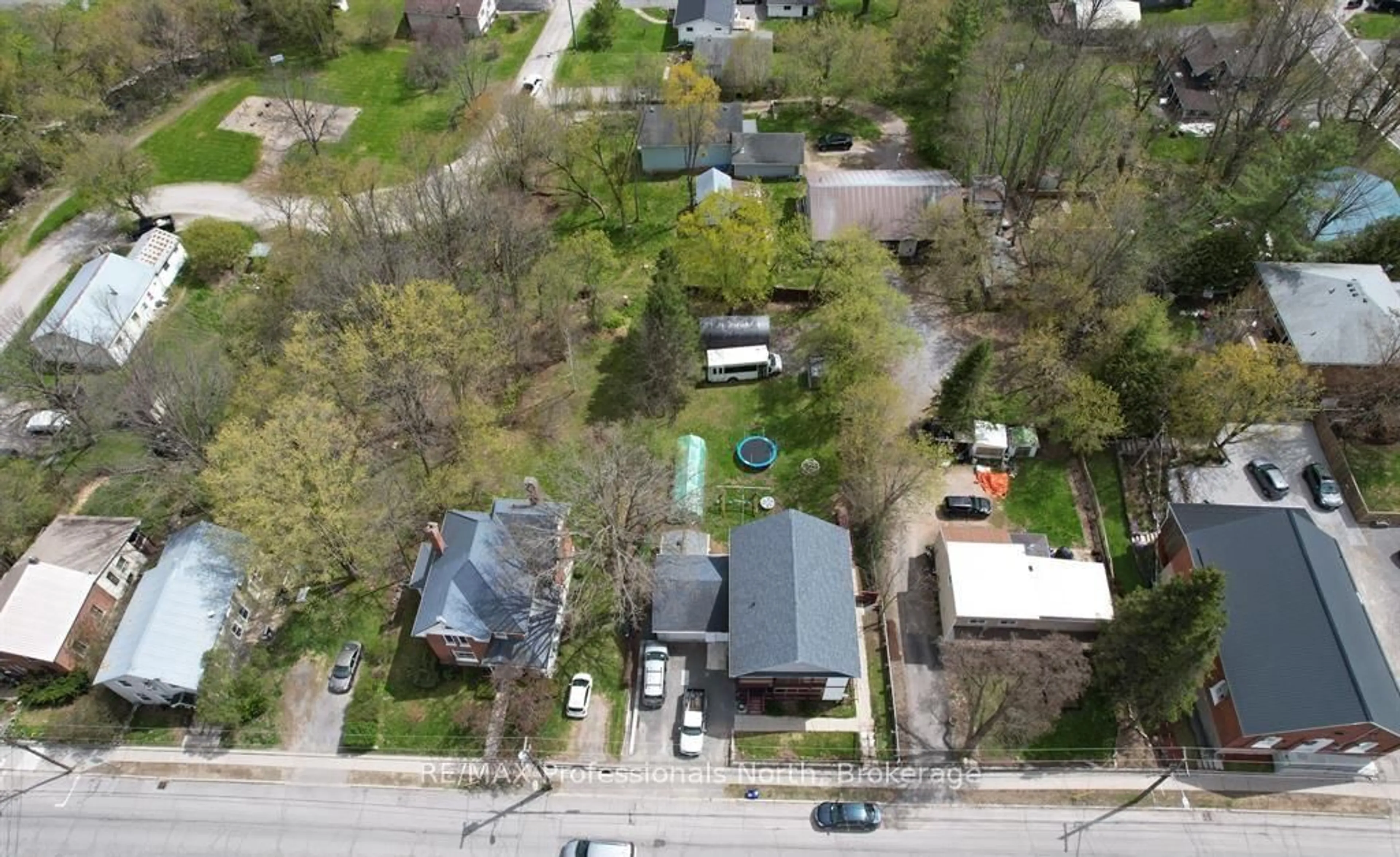A pic from outside/outdoor area/front of a property/back of a property/a pic from drone, street for 103 St Lawrence St, Madoc Ontario K0K 2K0
