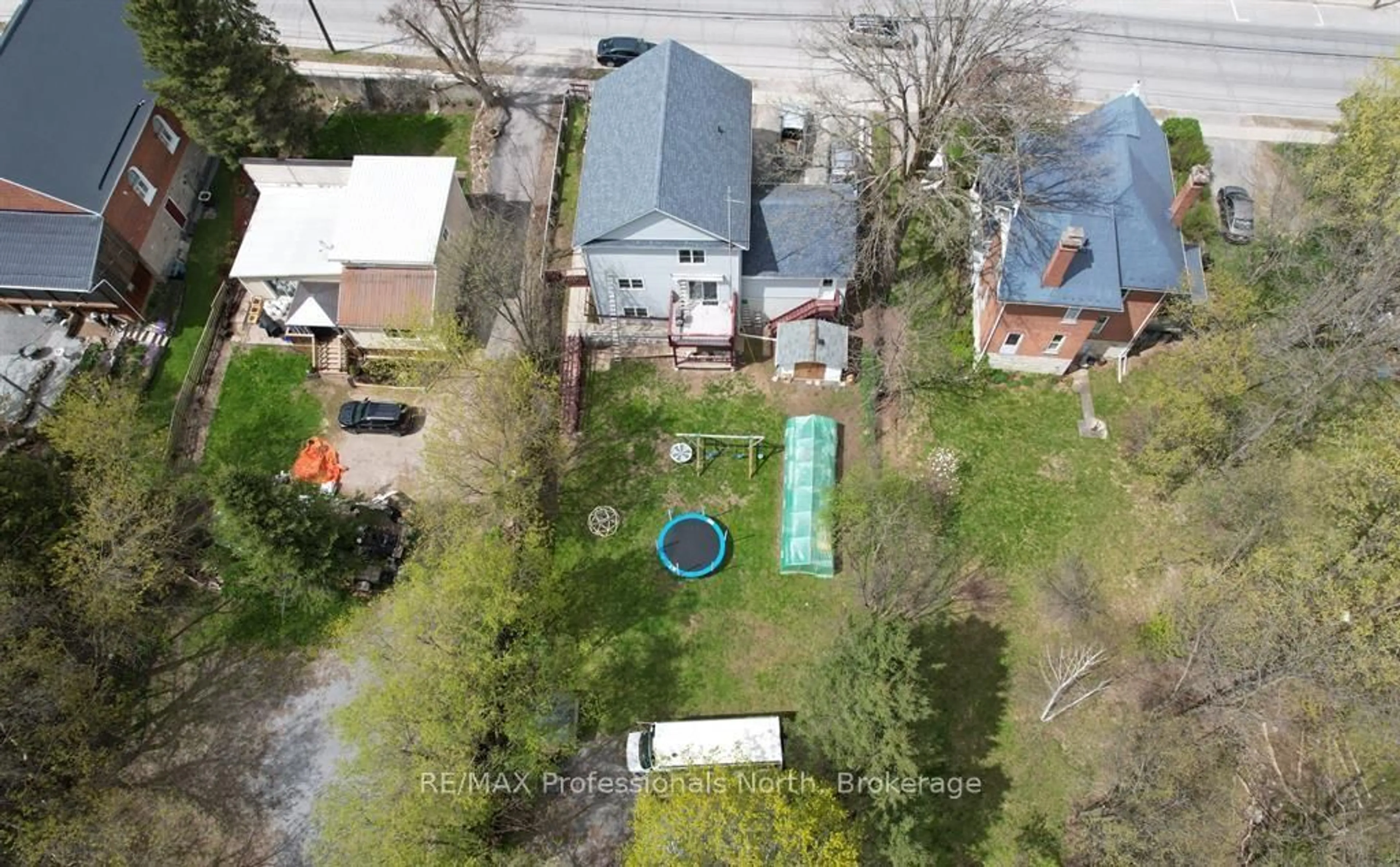 A pic from outside/outdoor area/front of a property/back of a property/a pic from drone, street for 103 St Lawrence St, Madoc Ontario K0K 2K0