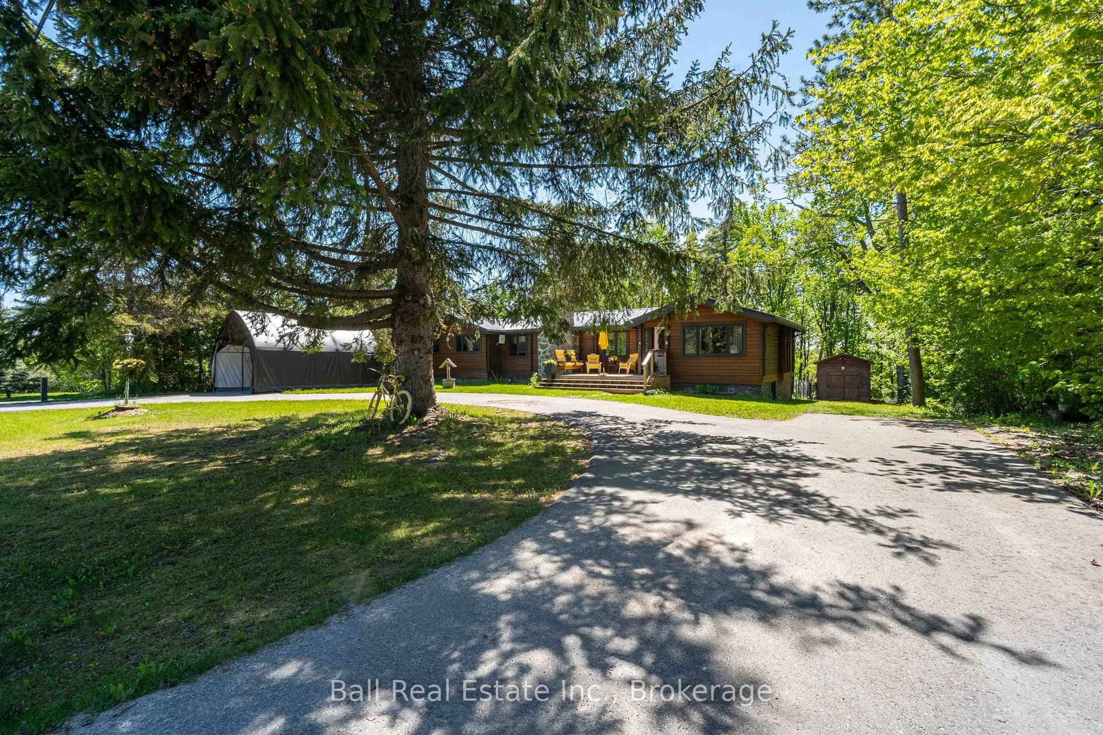 A pic from outside/outdoor area/front of a property/back of a property/a pic from drone, street for 1982 County Rd 8, Kawartha Lakes Ontario K0M 1A0