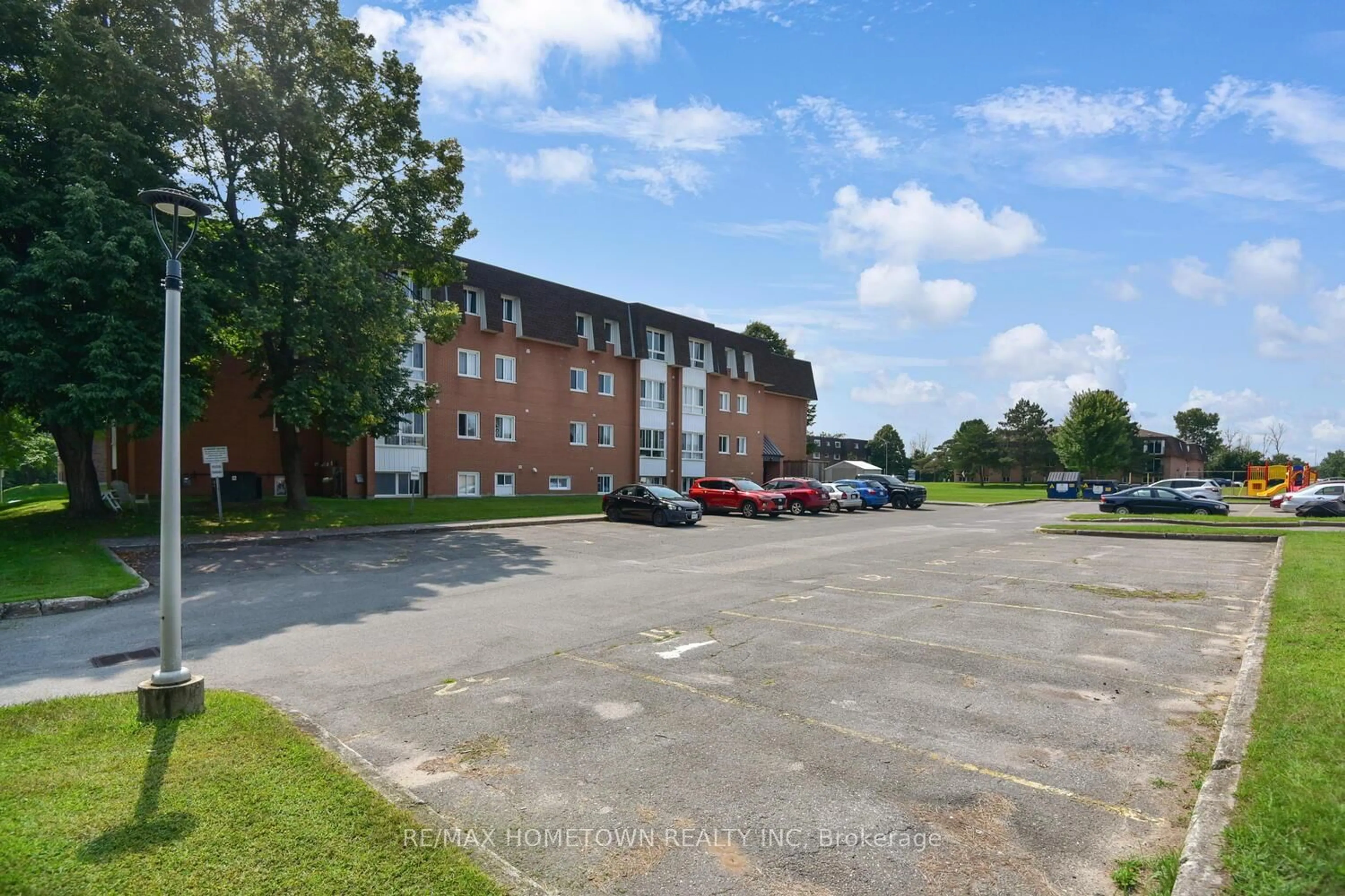 A pic from outside/outdoor area/front of a property/back of a property/a pic from drone, street for 810 Kyle Crt #202, Brockville Ontario K6V 6H6