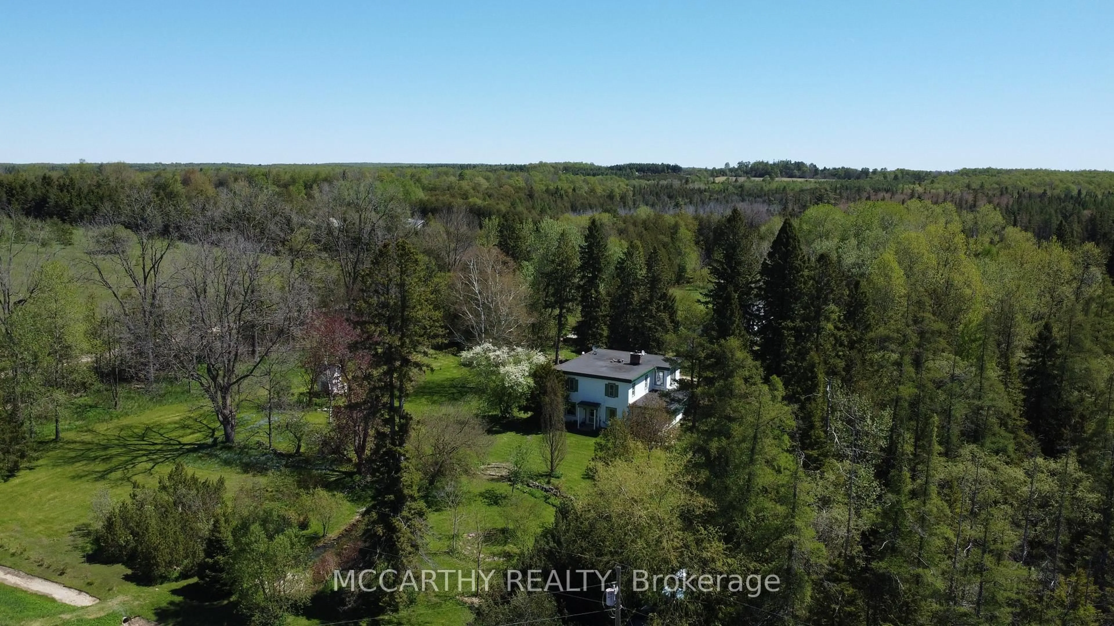 A pic from outside/outdoor area/front of a property/back of a property/a pic from drone, unknown for 315119 Highway 6 Highway, West Grey Ontario N0G 1R0