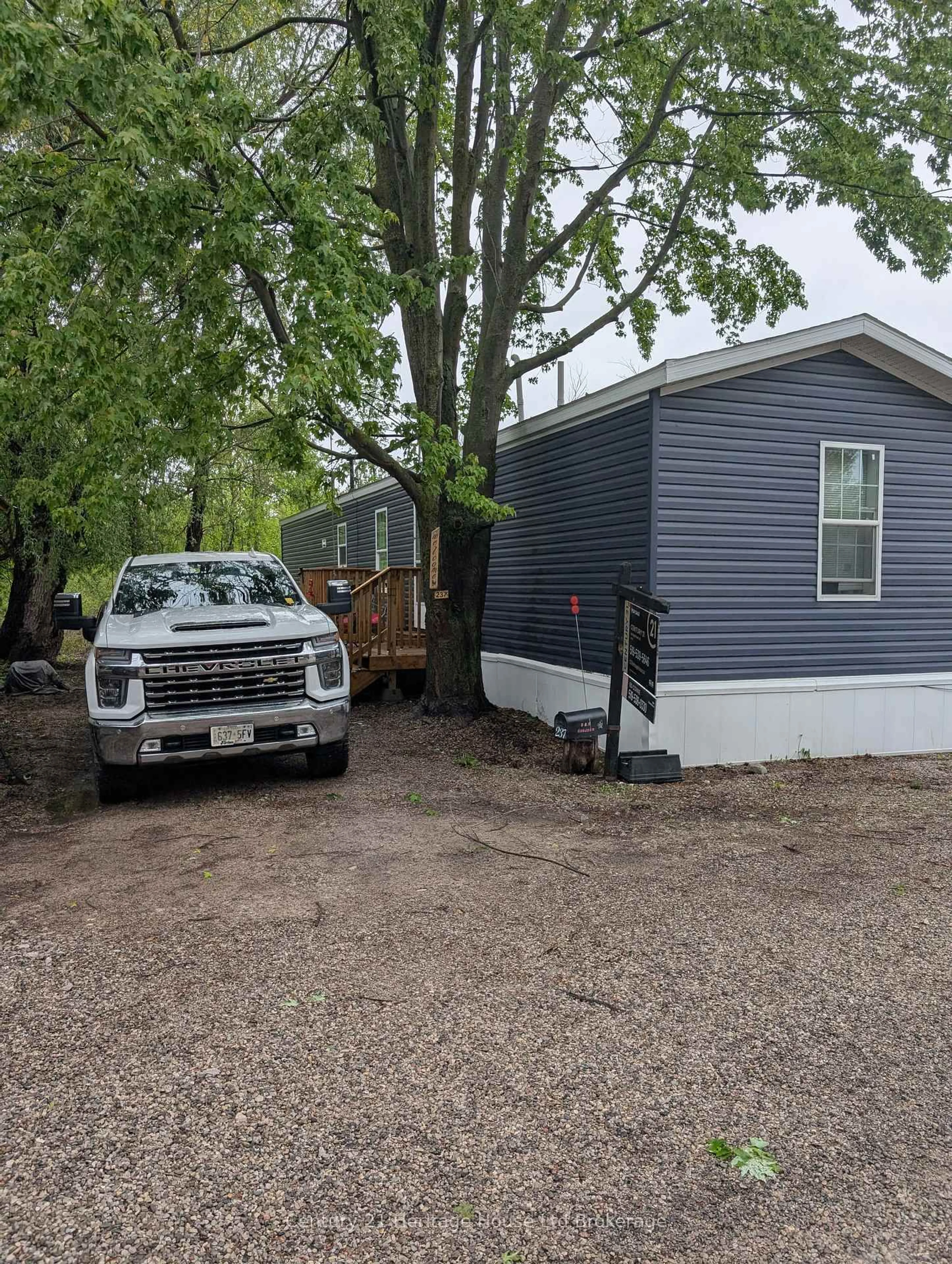 Home with vinyl exterior material, street for 99 FOURTH CONCESSION Rd #237, Brant Ontario N0E 1E0