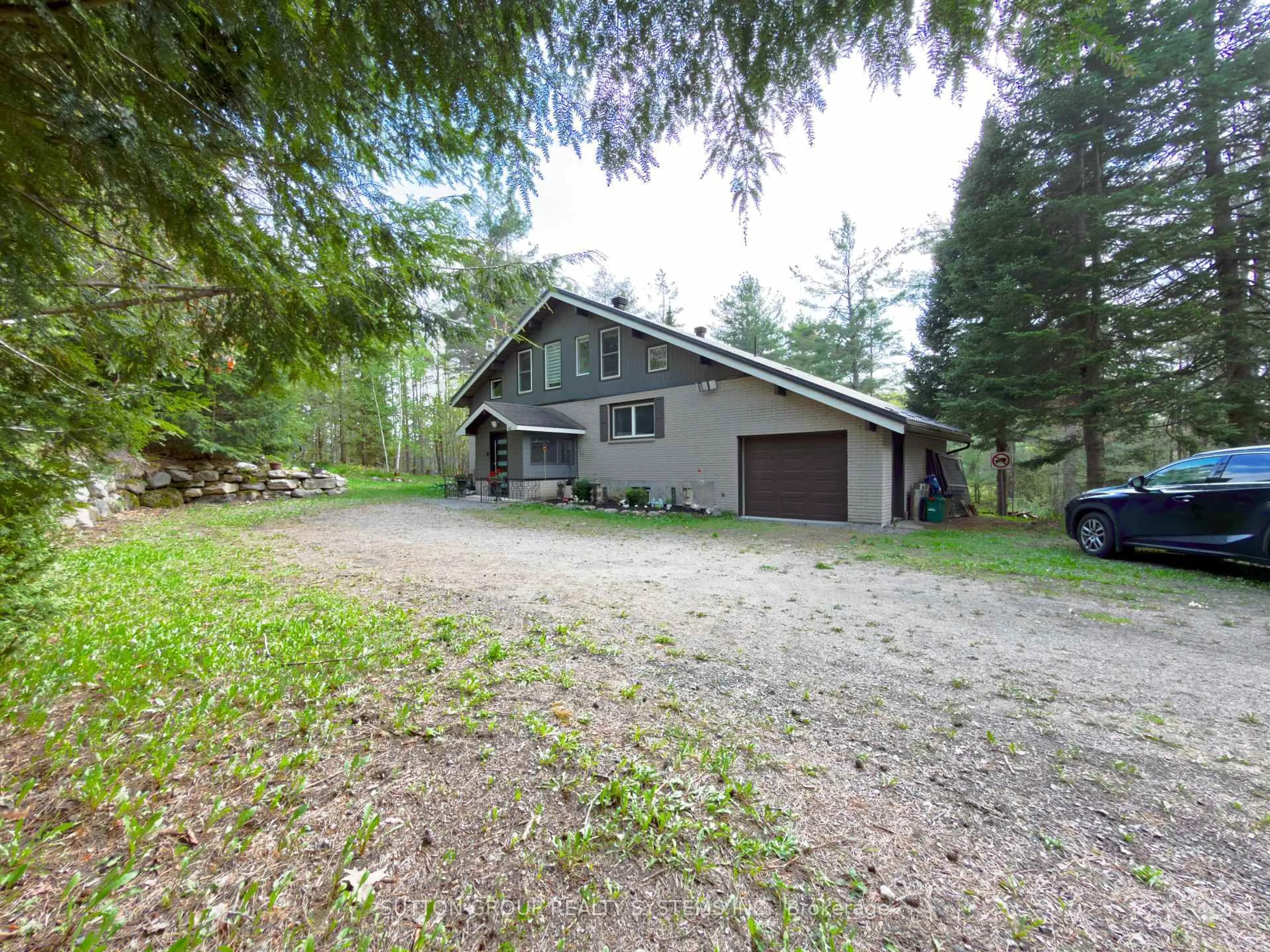 A pic from outside/outdoor area/front of a property/back of a property/a pic from drone, forest/trees view for 1018 Whites Rd, Muskoka Lakes Ontario P0B 1J0