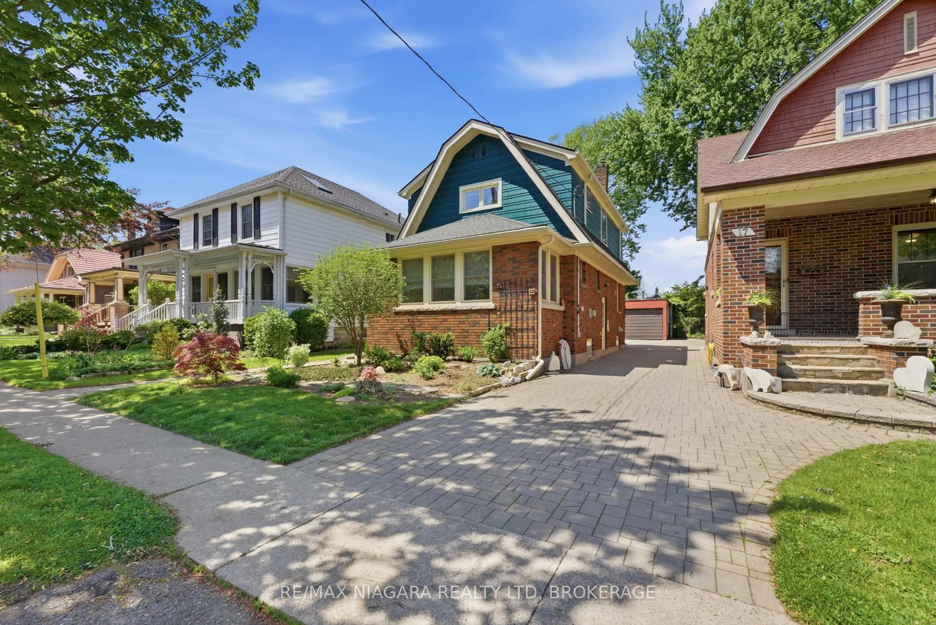 Home with brick exterior material, street for 15 1/2 Wolesley Ave, St. Catharines Ontario L2R 4T4