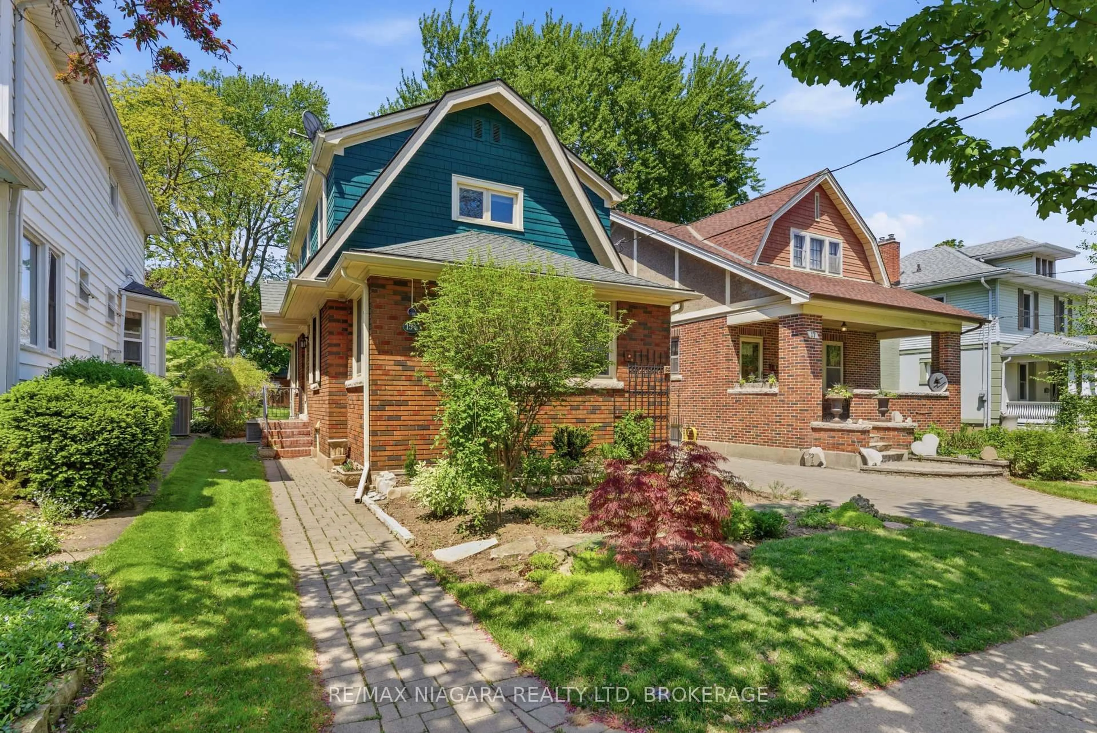 Home with brick exterior material, street for 15 1/2 Wolesley Ave, St. Catharines Ontario L2R 4T4