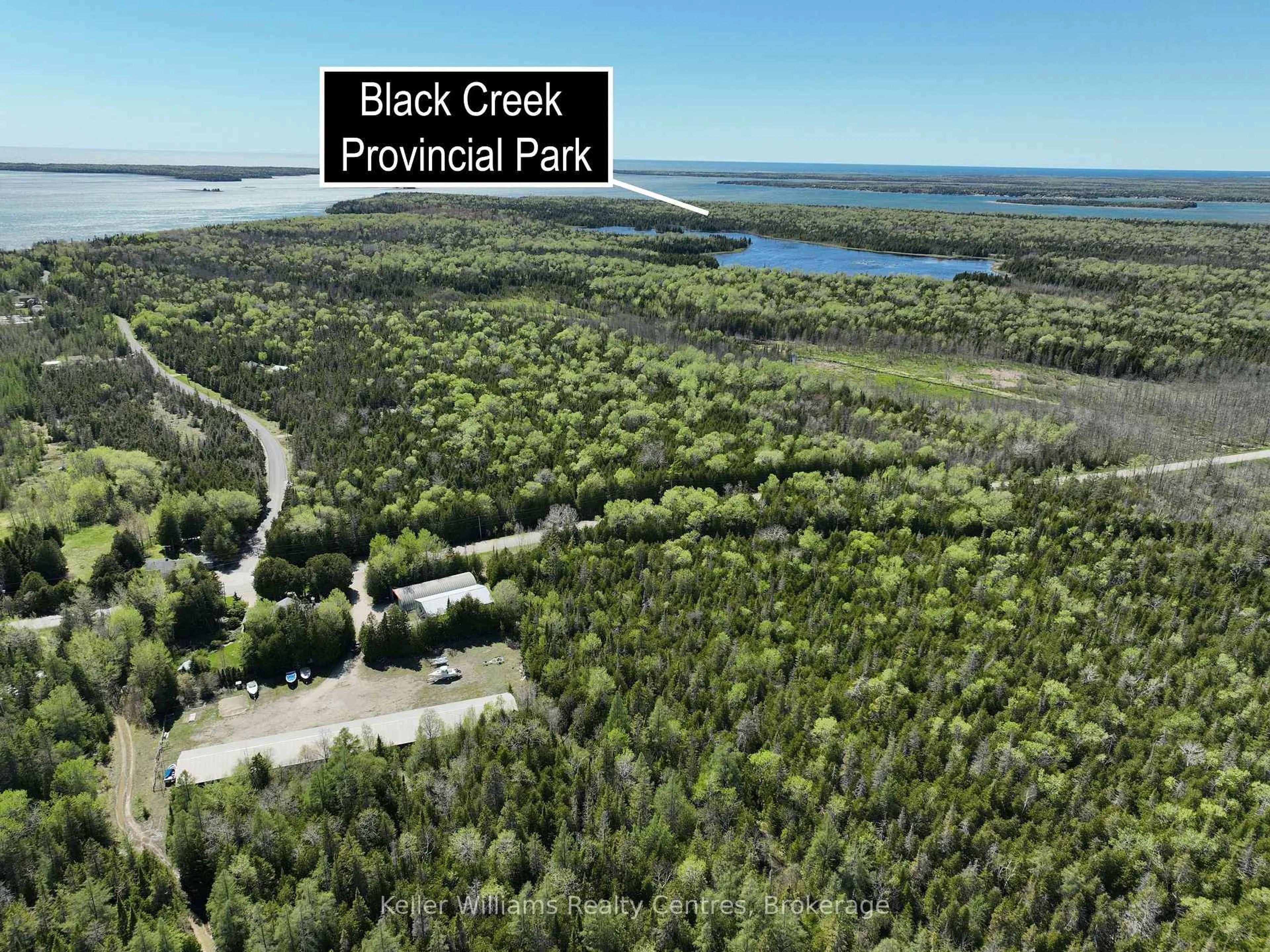 A pic from outside/outdoor area/front of a property/back of a property/a pic from drone, water/lake/river/ocean view for 158 Stokes Bay Rd, Northern Bruce Peninsula Ontario N0H 1W0
