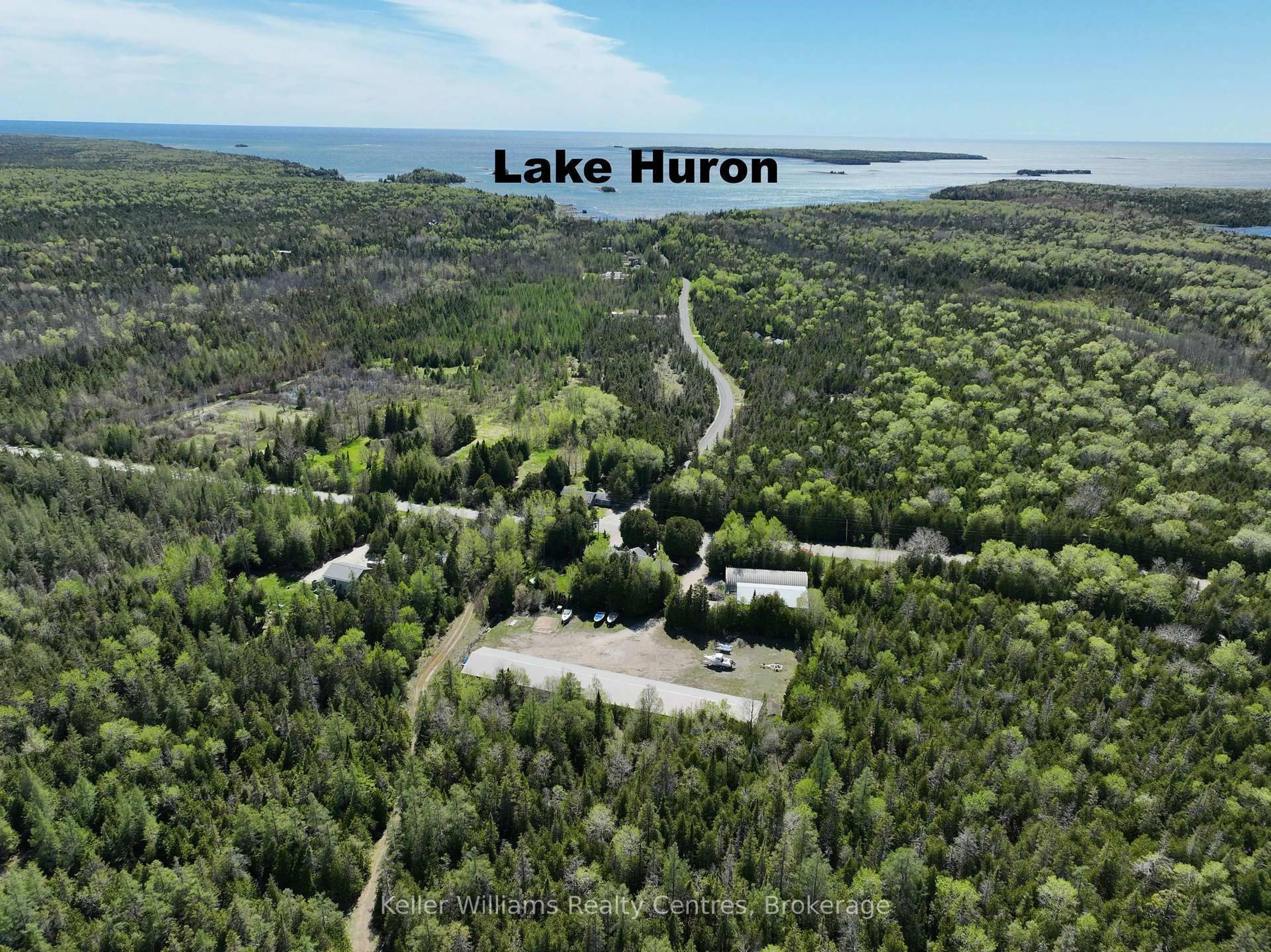 A pic from outside/outdoor area/front of a property/back of a property/a pic from drone, water/lake/river/ocean view for 158 Stokes Bay Rd, Northern Bruce Peninsula Ontario N0H 1W0
