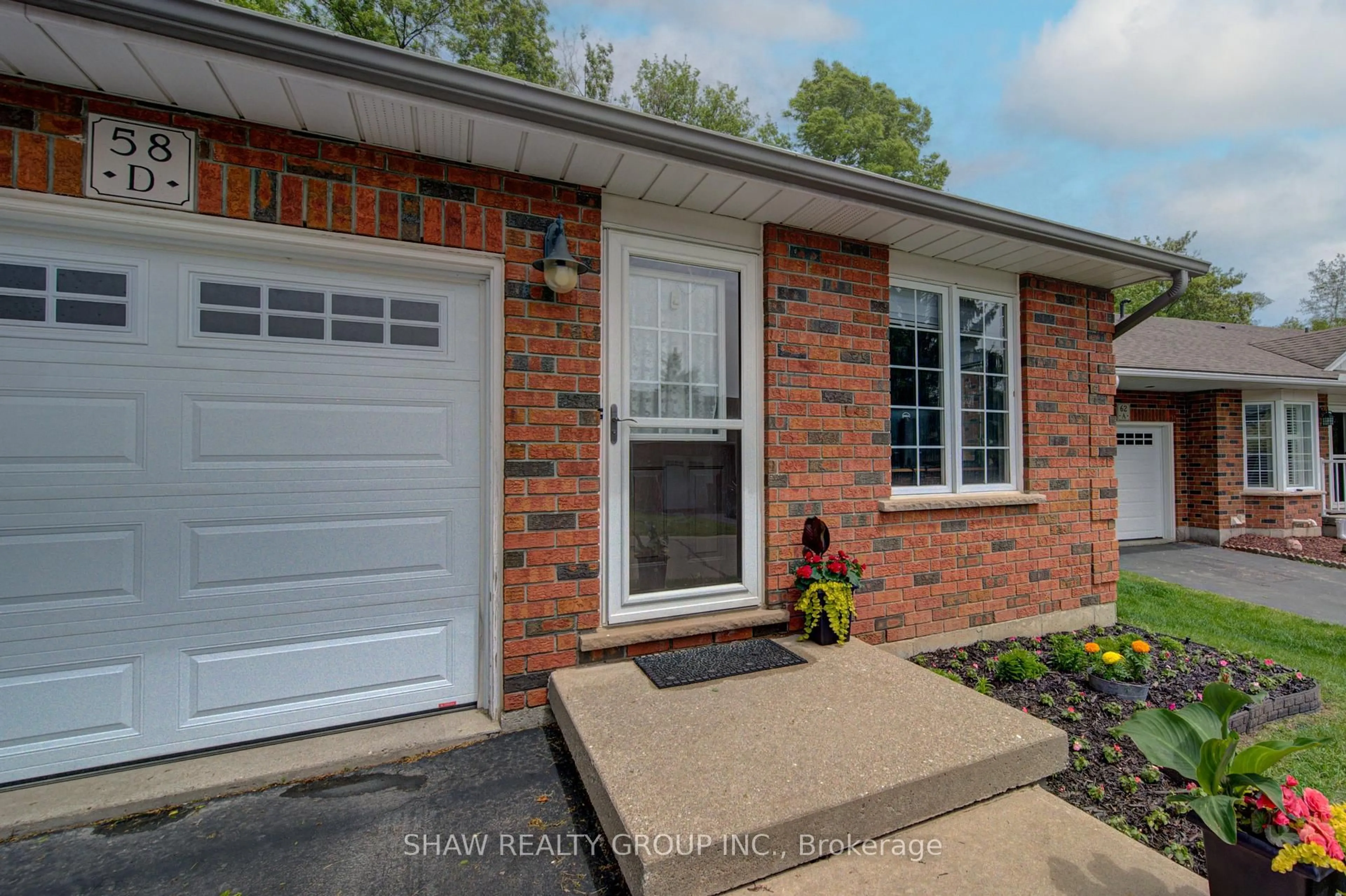 Home with brick exterior material, street for 58D Harris Ave, Brantford Ontario N3R 2E9