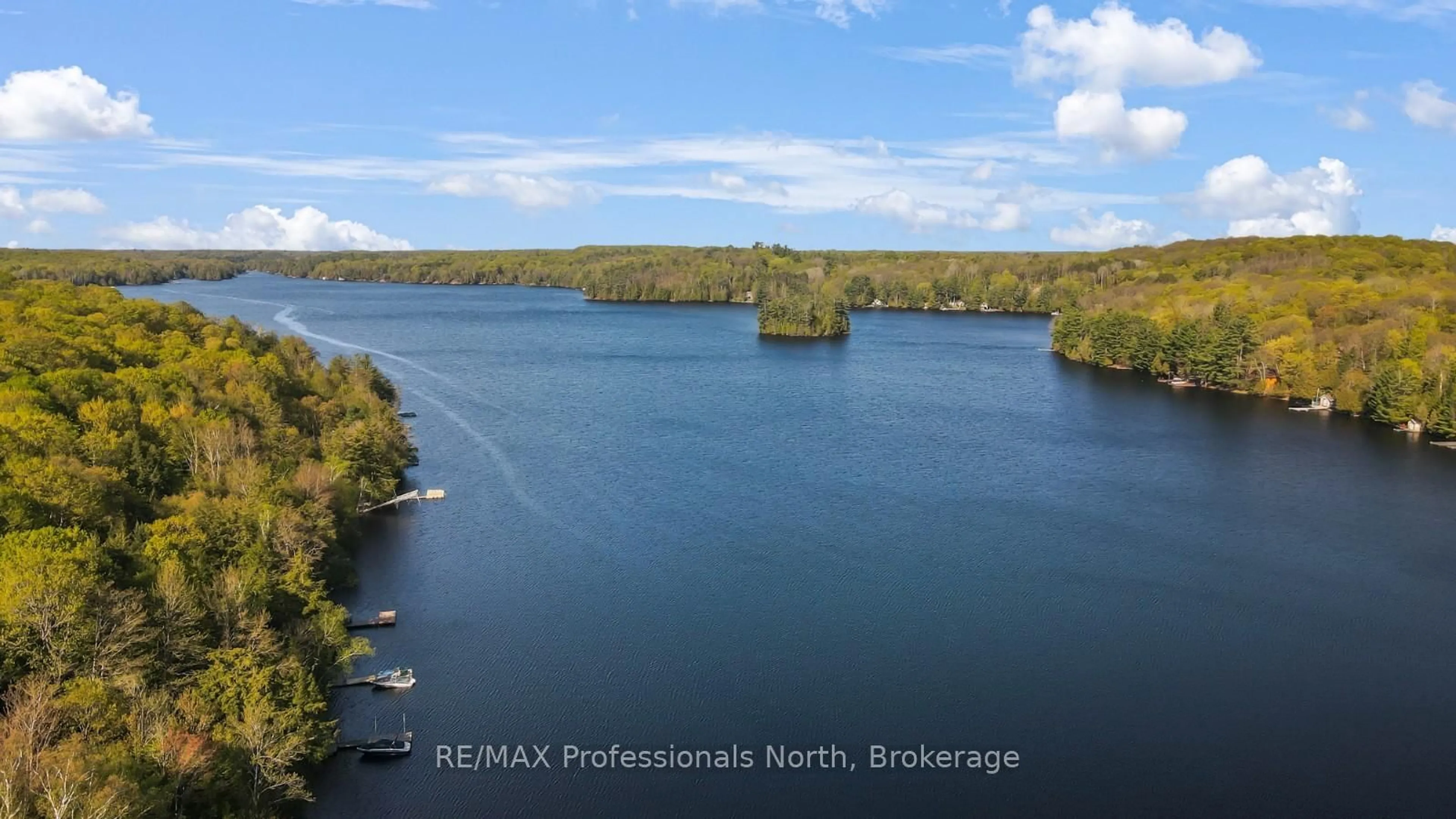 A pic from outside/outdoor area/front of a property/back of a property/a pic from drone, water/lake/river/ocean view for 1096 Gravel Pit Rd, Minden Hills Ontario K0M 2K0