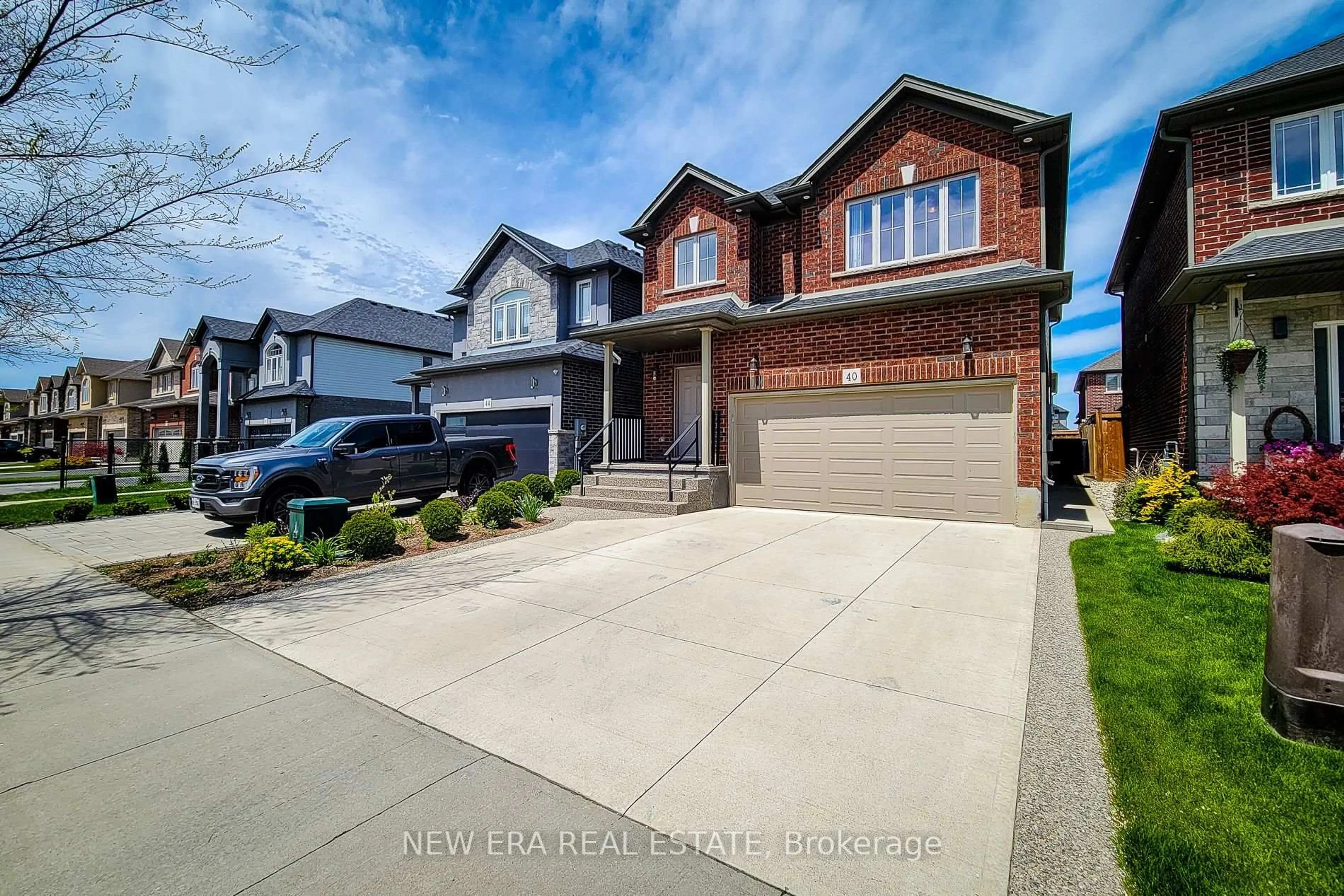 Home with brick exterior material, street for 40 Fairgrounds Dr, Hamilton Ontario L0R 1C0