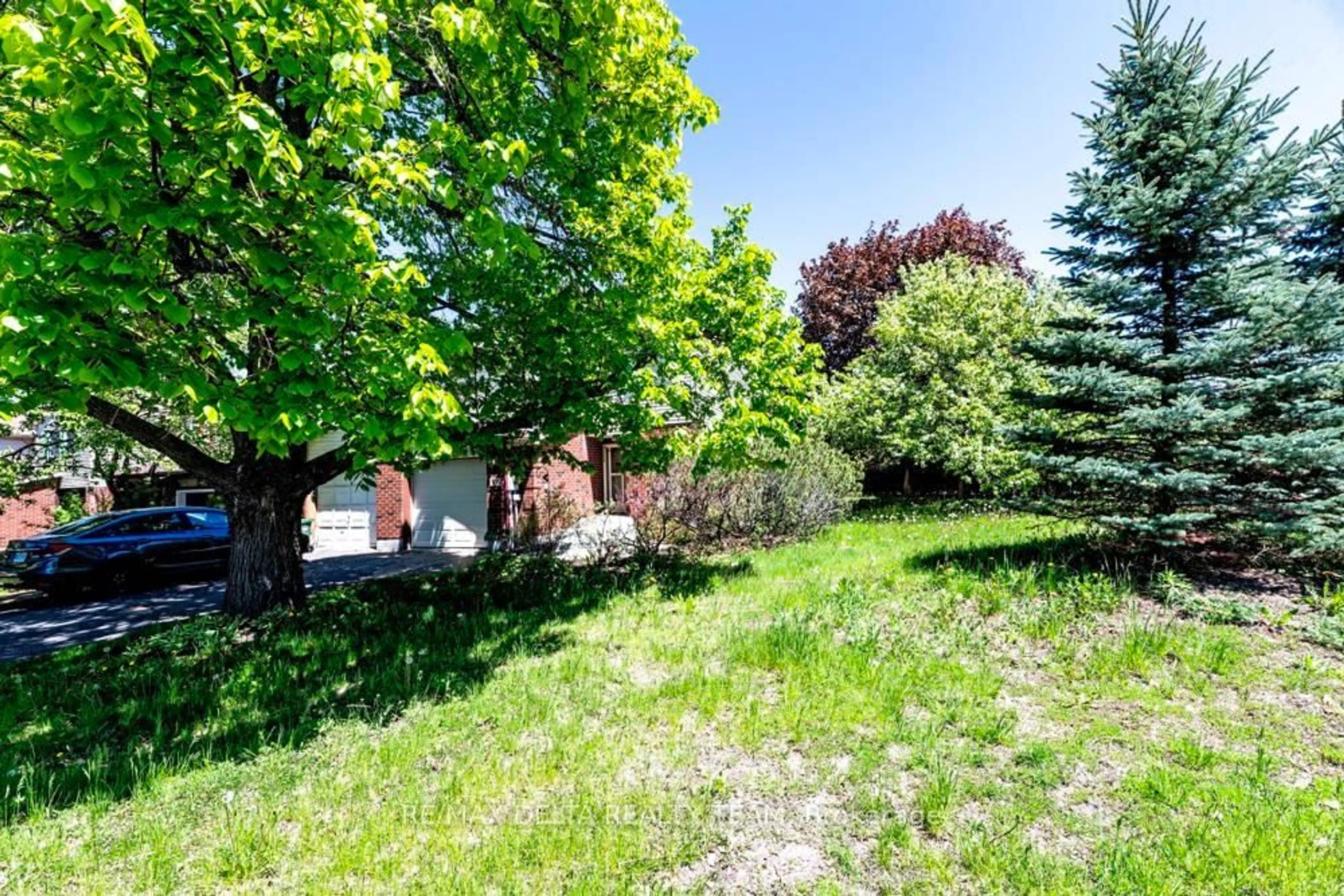 A pic from outside/outdoor area/front of a property/back of a property/a pic from drone, forest/trees view for 132 Acklam Terr, Ottawa Ontario K2K 2J5