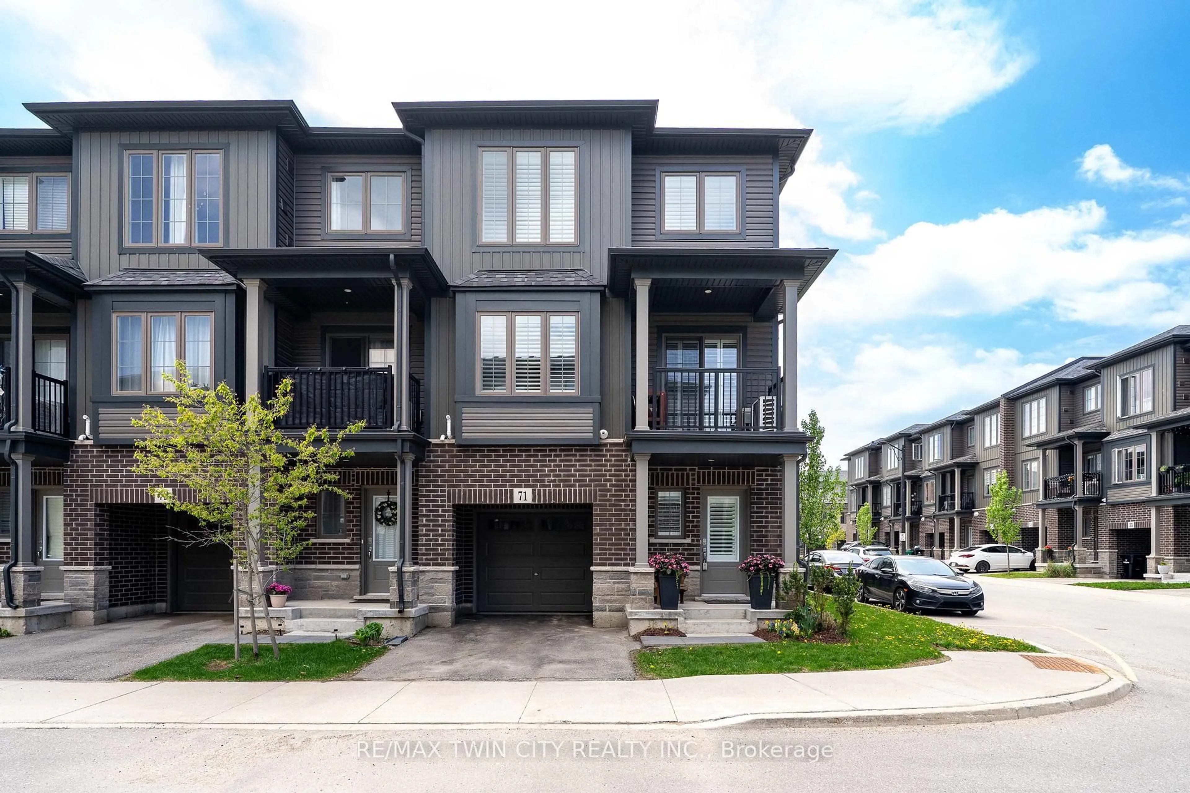Home with brick exterior material, street for 124 Compass Tr #71, Cambridge Ontario N3E 0E3