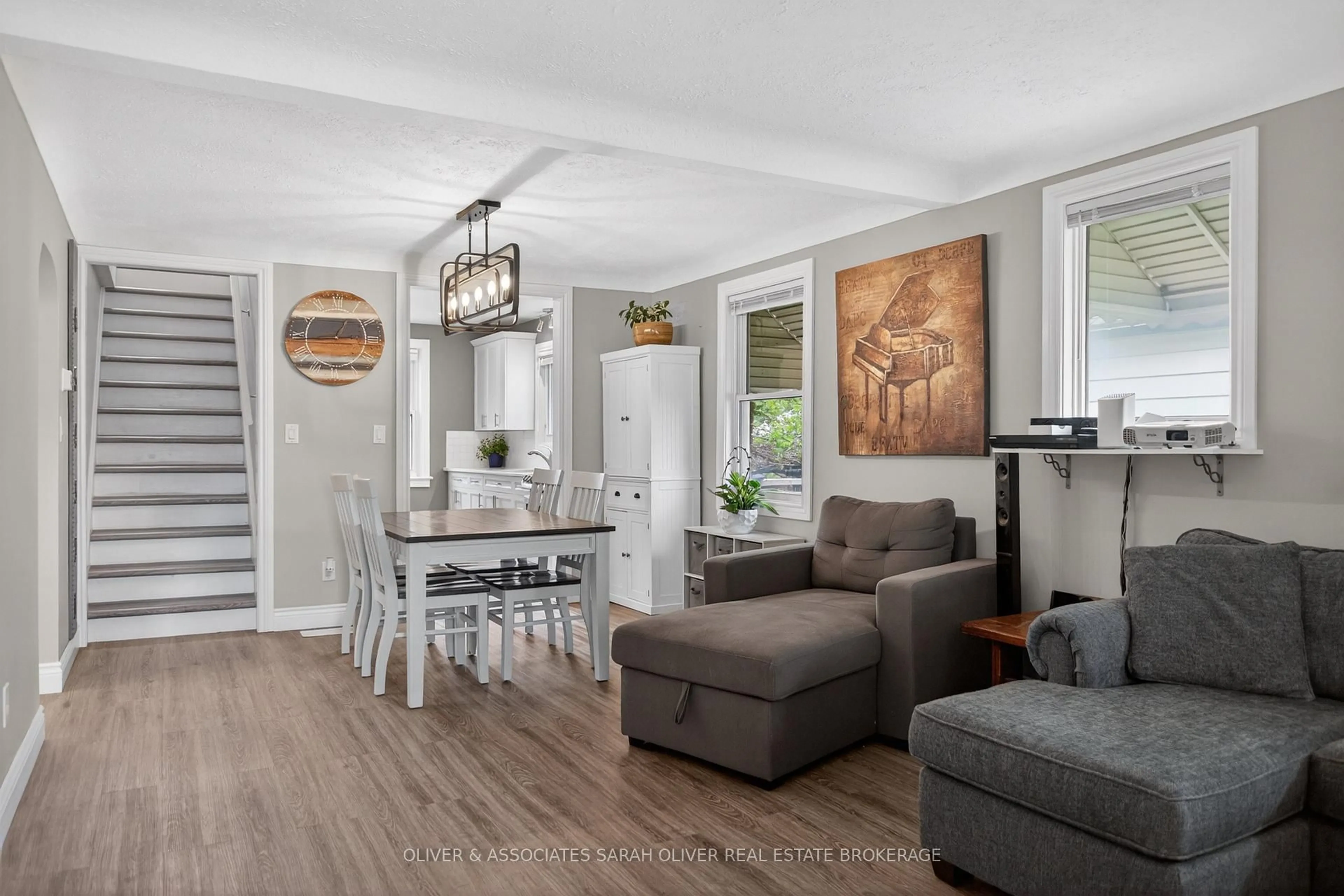 Living room with furniture, wood/laminate floor for 24 Third Ave, St. Thomas Ontario N5R 4J9