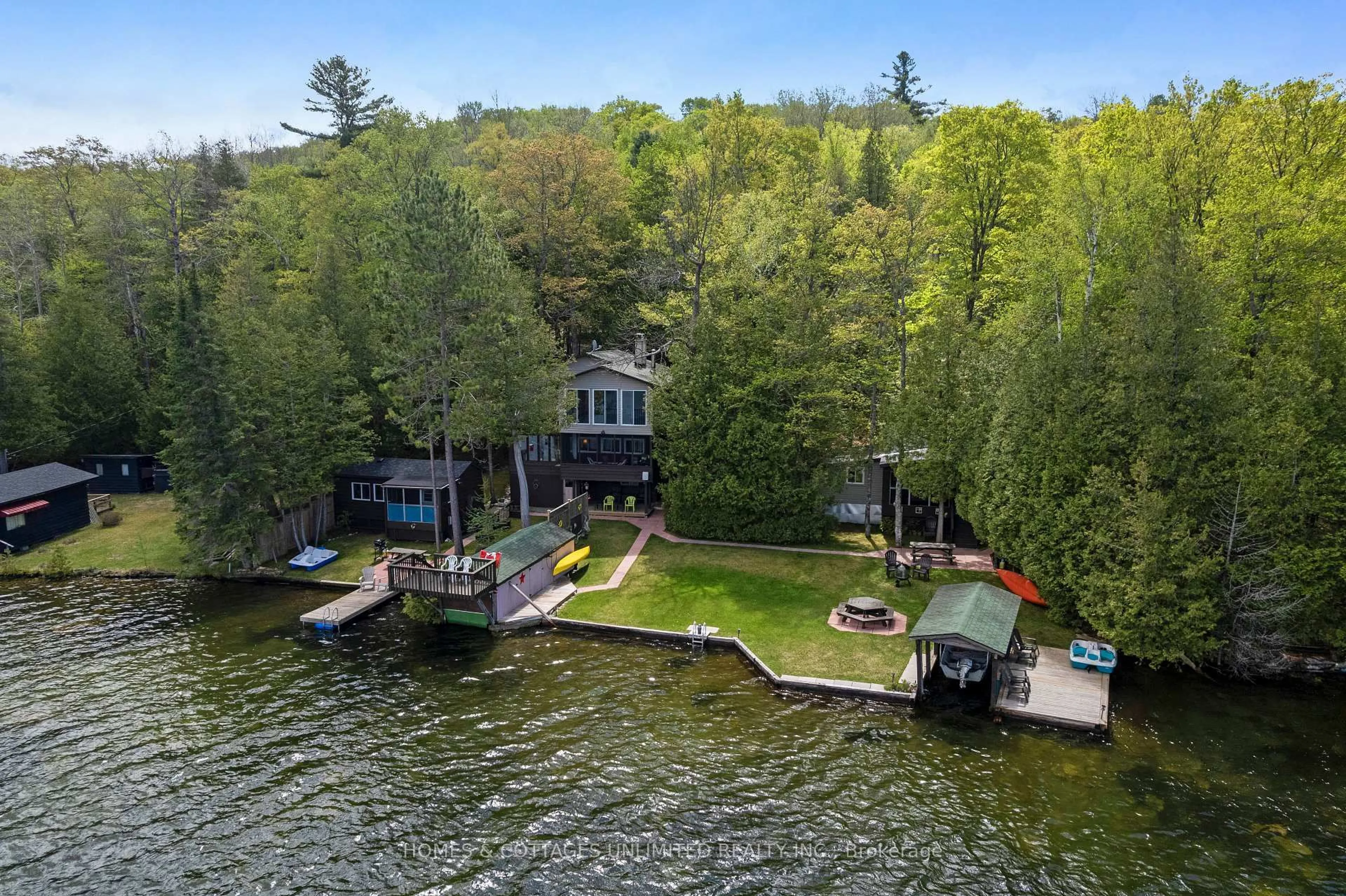 A pic from outside/outdoor area/front of a property/back of a property/a pic from drone, water/lake/river/ocean view for 1070 Young Lane, Ompah Ontario K0H 2J0