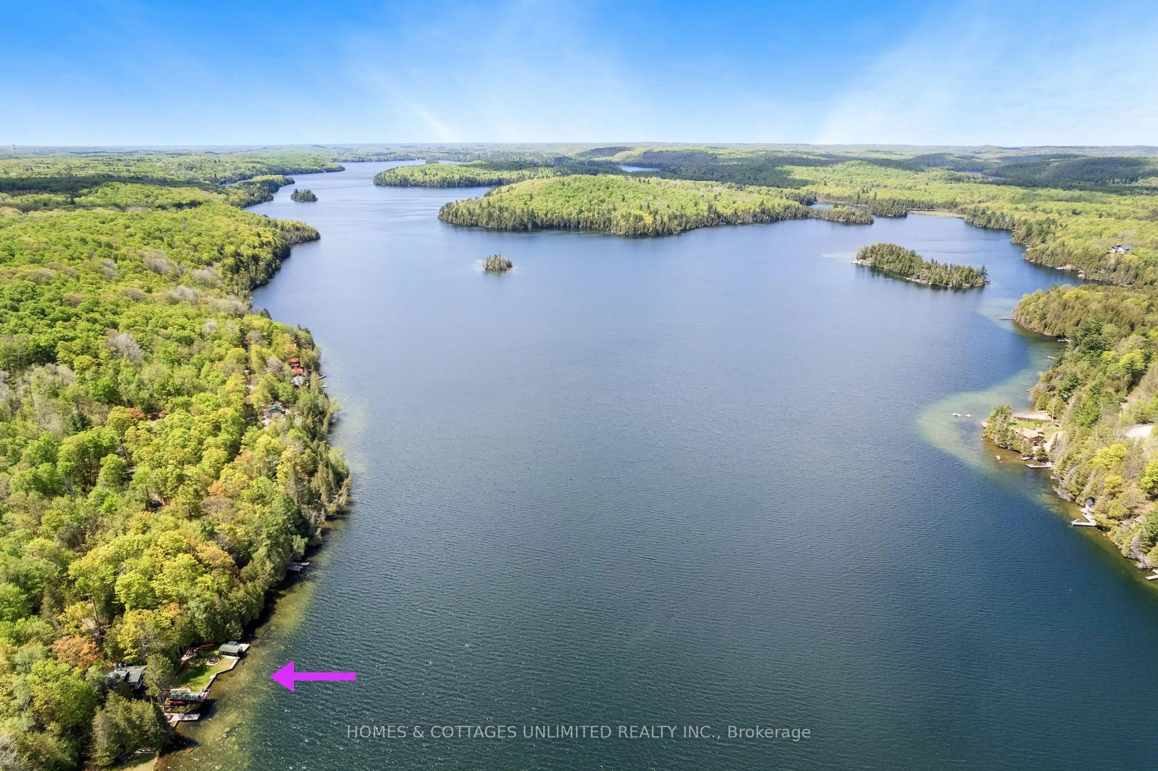 A pic from outside/outdoor area/front of a property/back of a property/a pic from drone, water/lake/river/ocean view for 1070 Young Lane, Ompah Ontario K0H 2J0