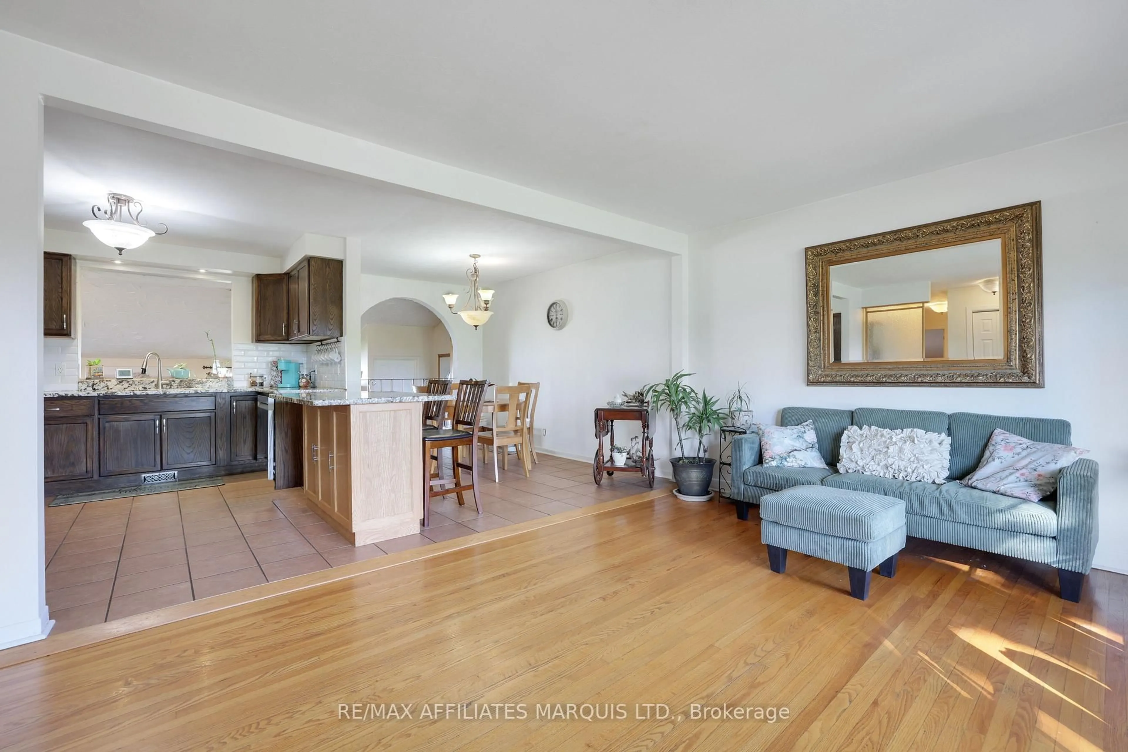 Living room with furniture, wood/laminate floor for 428 Bellevue Cres, Cornwall Ontario K6H 5M9