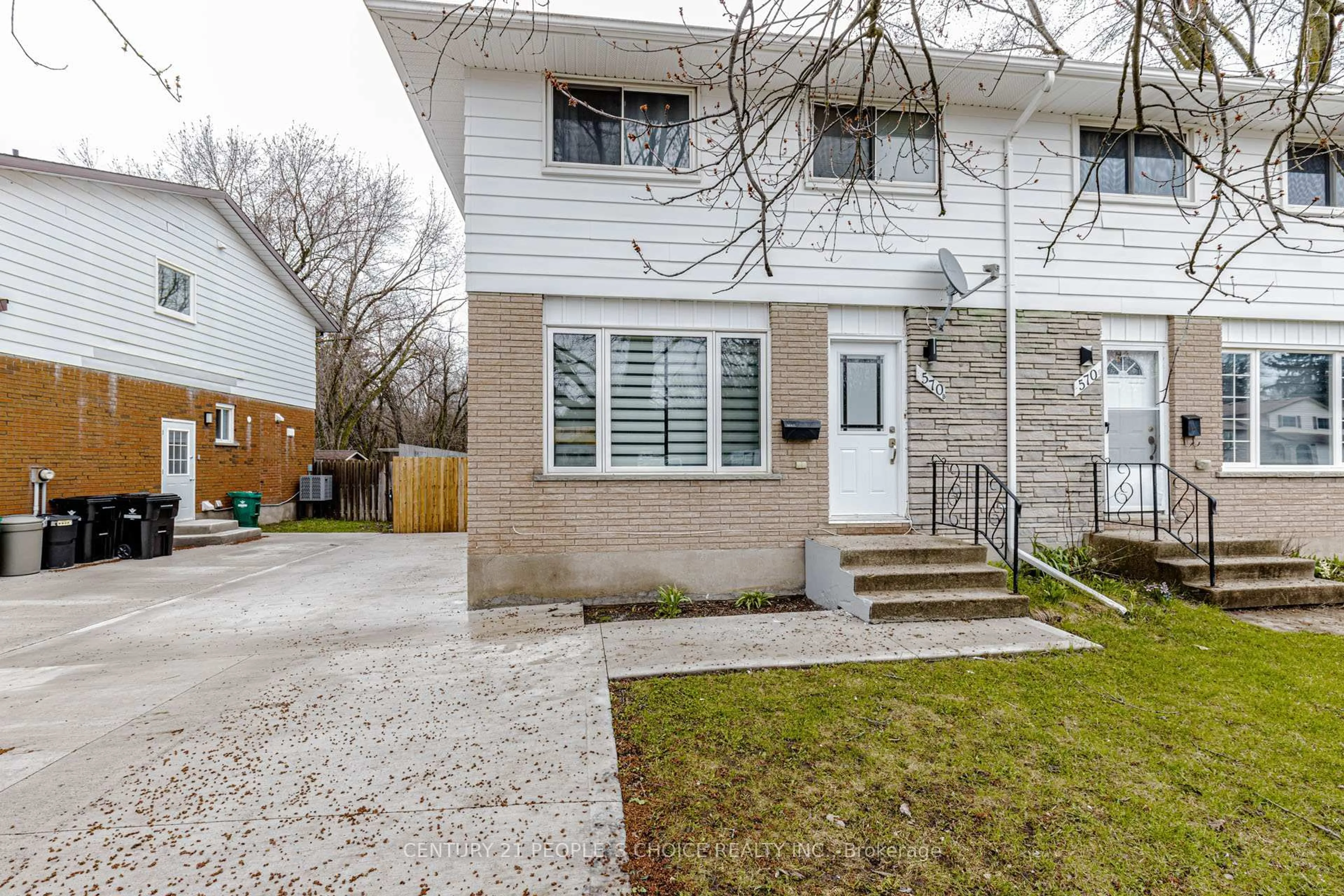 Home with vinyl exterior material, street for 570B Glen Forrest Blvd, Waterloo Ontario N2L 4J5