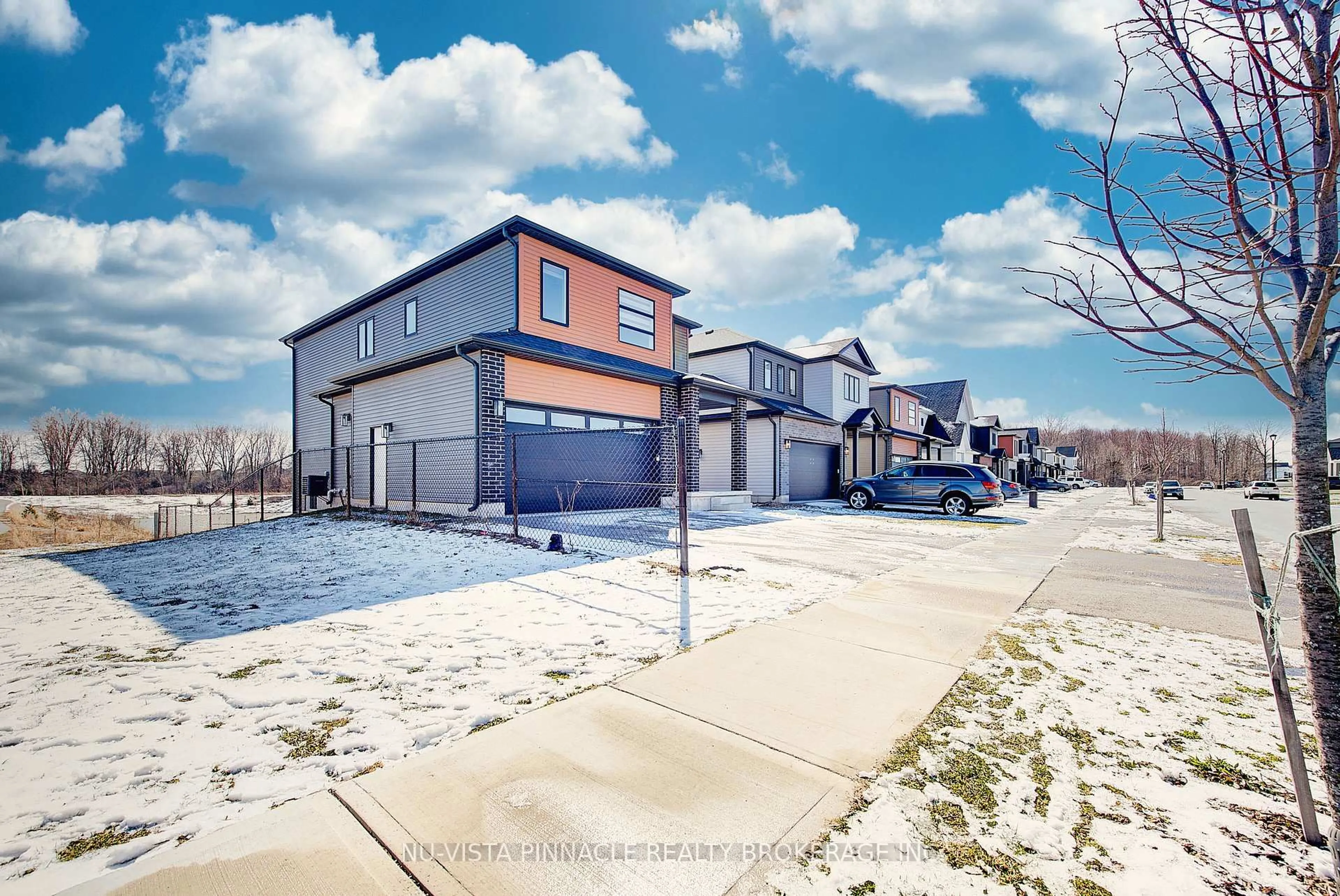 A pic from outside/outdoor area/front of a property/back of a property/a pic from drone, street for 1377 Twilite Blvd, London North Ontario N6G 3R5