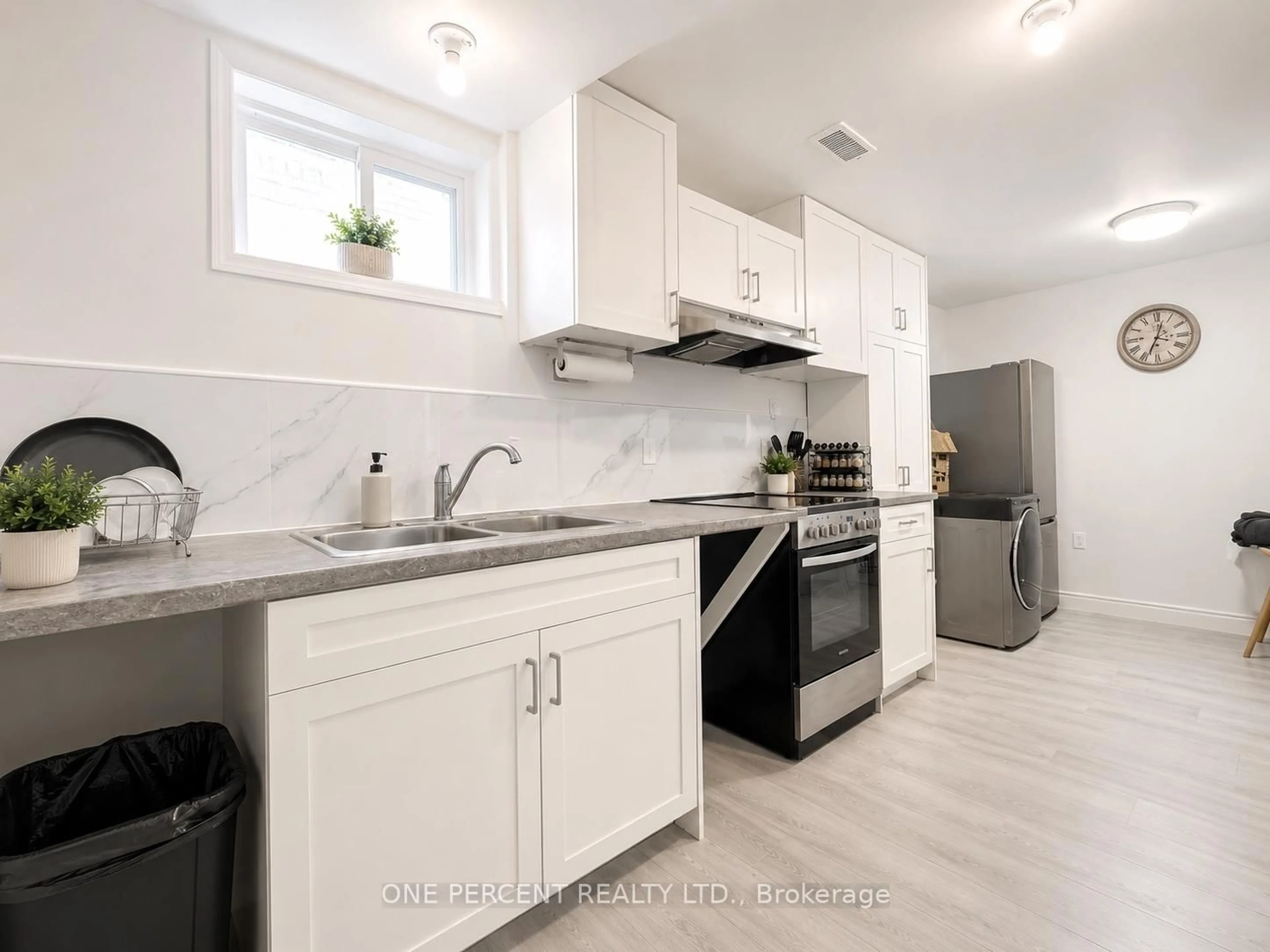 Open concept kitchen, ceramic/tile floor for 84 Elgar Ave, Hamilton Ontario L9C 4E5
