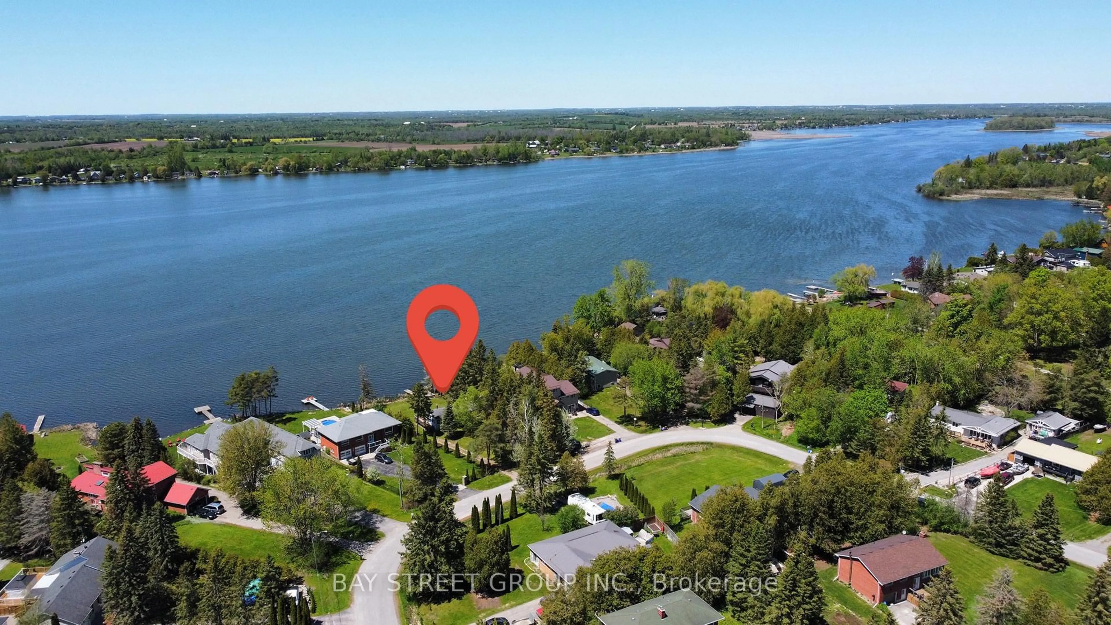 A pic from outside/outdoor area/front of a property/back of a property/a pic from drone, water/lake/river/ocean view for 33 Cedar Cres, Kawartha Lakes Ontario L0B 1K0