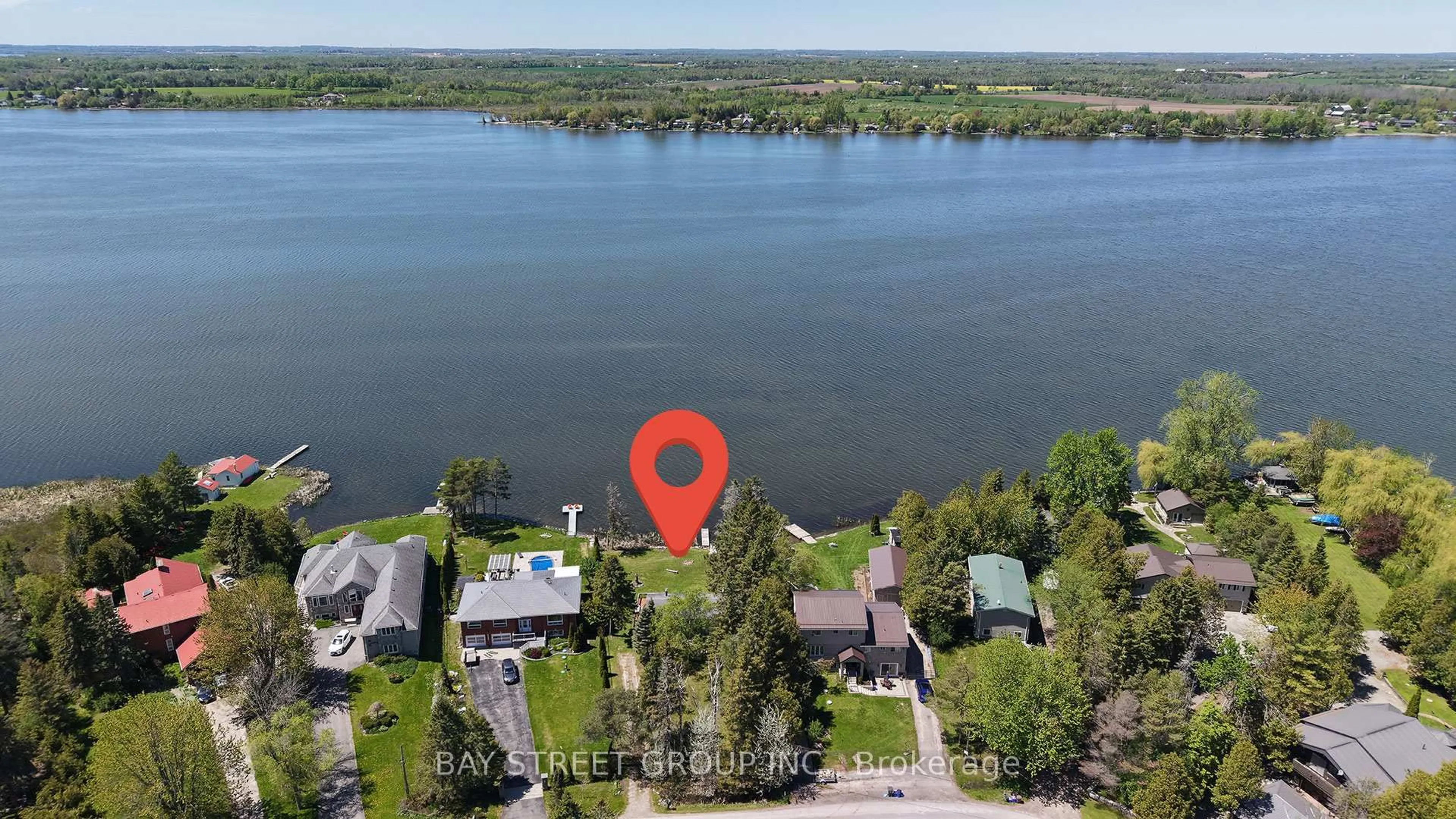 A pic from outside/outdoor area/front of a property/back of a property/a pic from drone, water/lake/river/ocean view for 33 Cedar Cres, Kawartha Lakes Ontario L0B 1K0