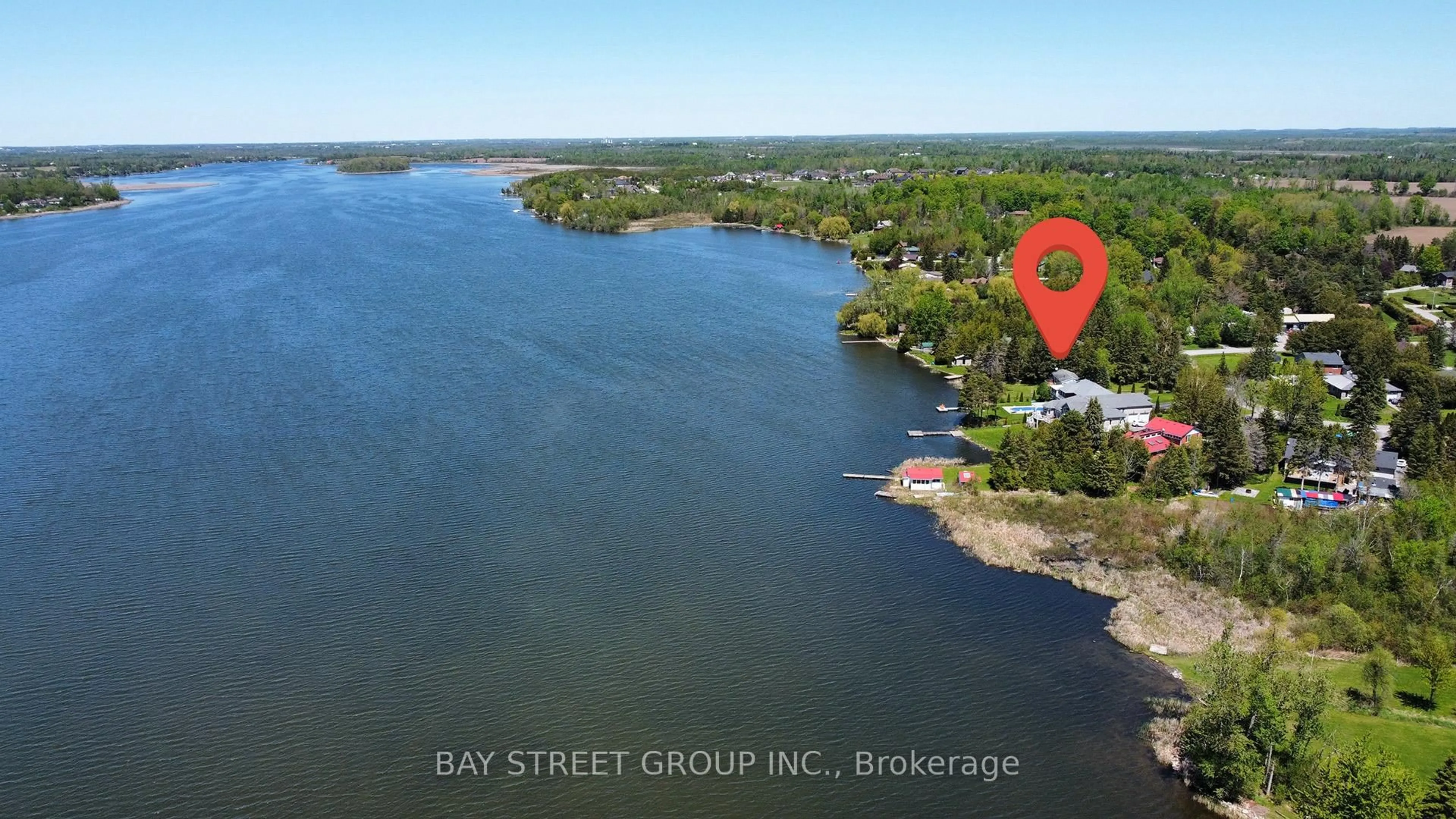 A pic from outside/outdoor area/front of a property/back of a property/a pic from drone, water/lake/river/ocean view for 33 Cedar Cres, Kawartha Lakes Ontario L0B 1K0