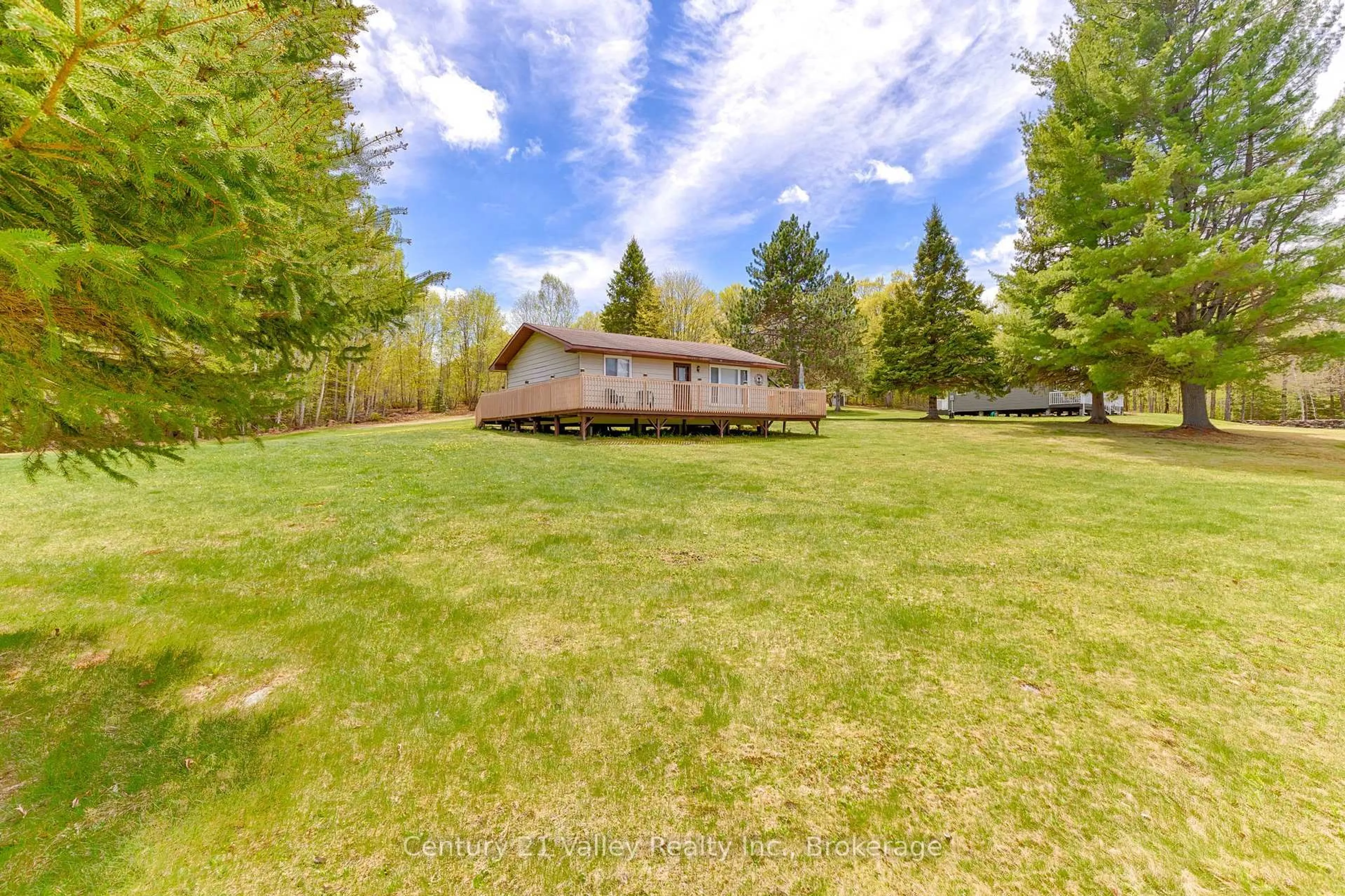 A pic from outside/outdoor area/front of a property/back of a property/a pic from drone, water/lake/river/ocean view for 89A Lake Lapinskie Lane, Wilno Ontario K0J 2N0