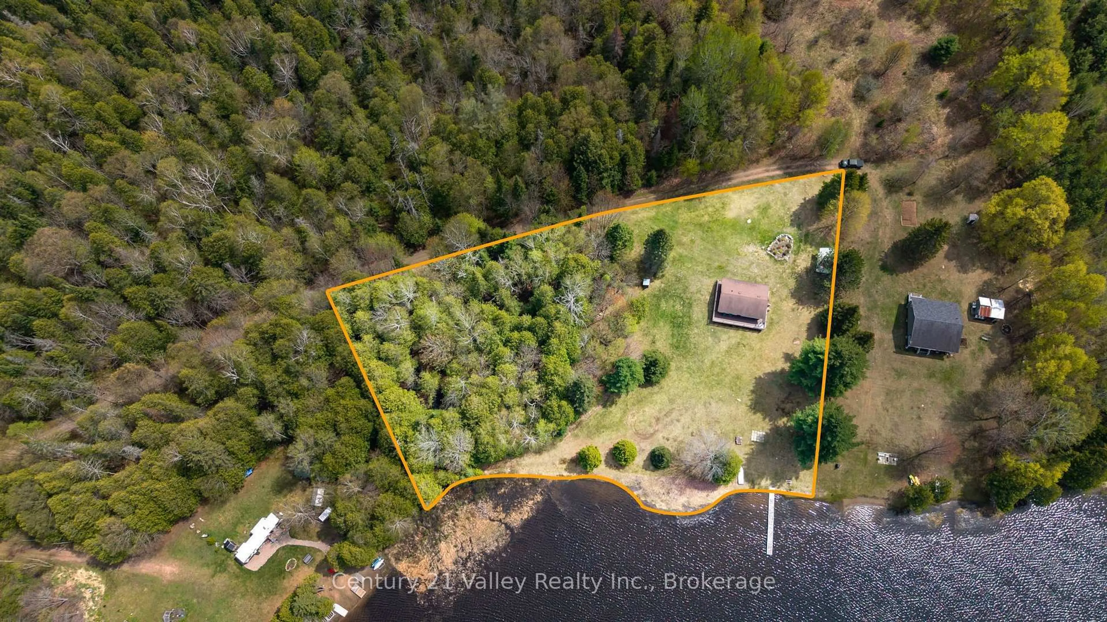 A pic from outside/outdoor area/front of a property/back of a property/a pic from drone, water/lake/river/ocean view for 89A Lake Lapinskie Lane, Wilno Ontario K0J 2N0
