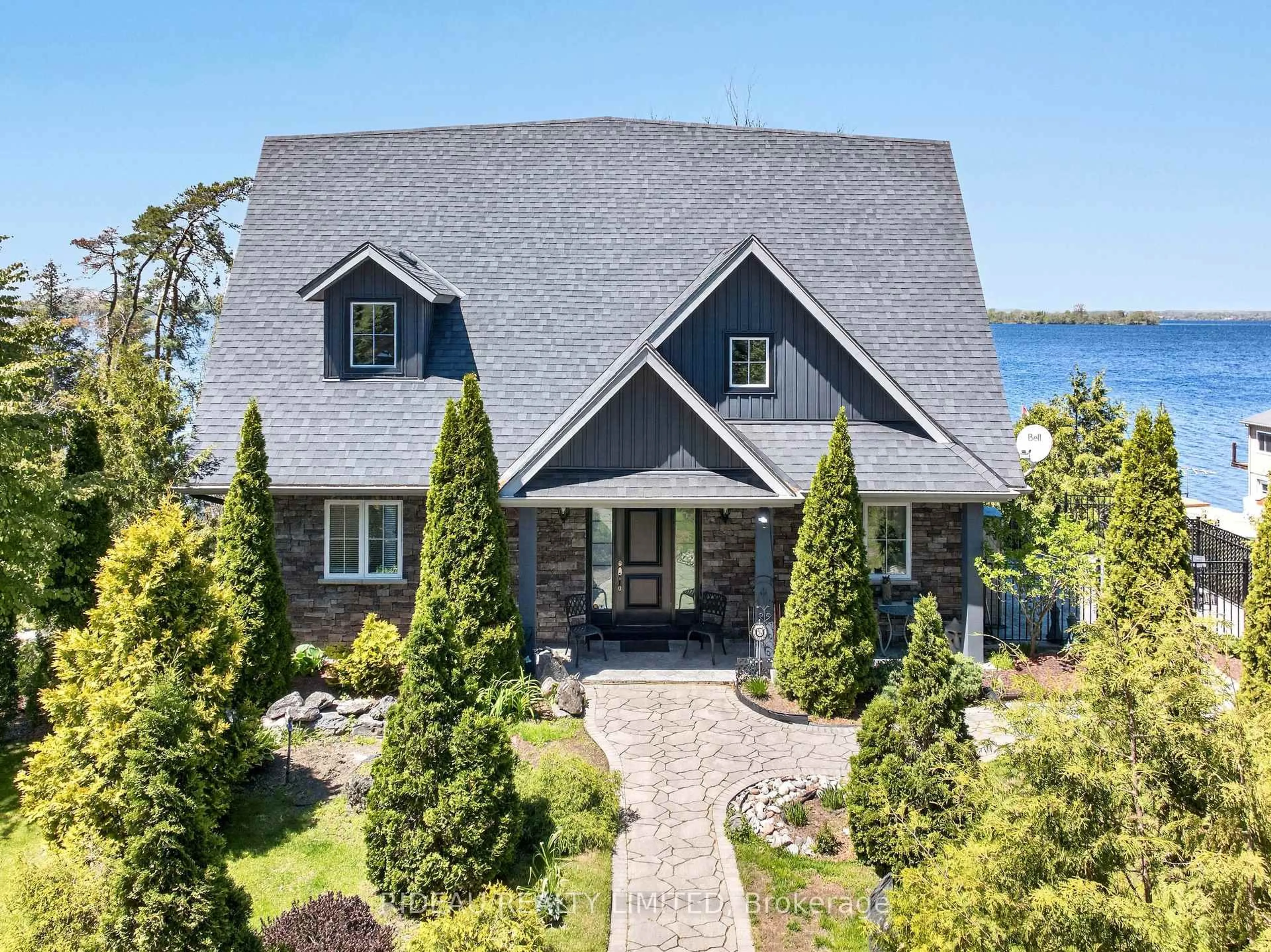 Home with brick exterior material, water/lake/river/ocean view for 3592 County 3 Rd, Prince Edward County Ontario K0K 1L0