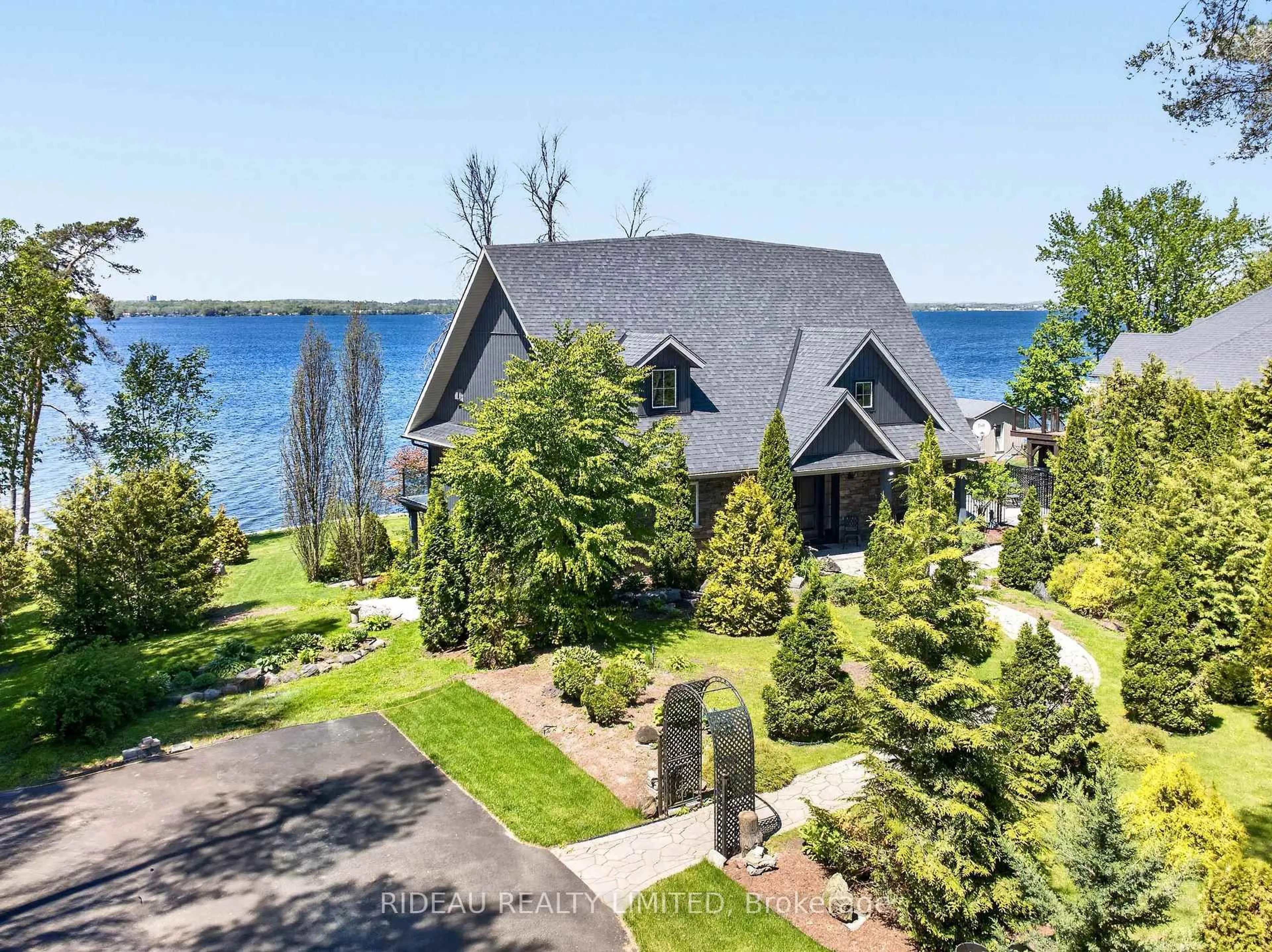 A pic from outside/outdoor area/front of a property/back of a property/a pic from drone, water/lake/river/ocean view for 3592 County 3 Rd, Prince Edward County Ontario K0K 1L0