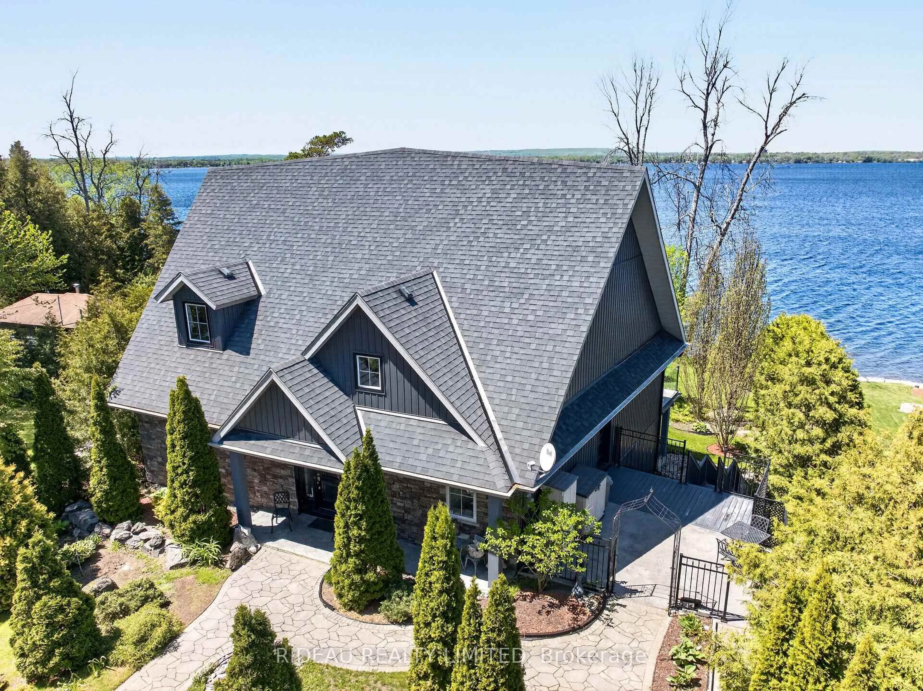 A pic from outside/outdoor area/front of a property/back of a property/a pic from drone, water/lake/river/ocean view for 3592 County 3 Rd, Prince Edward County Ontario K0K 1L0