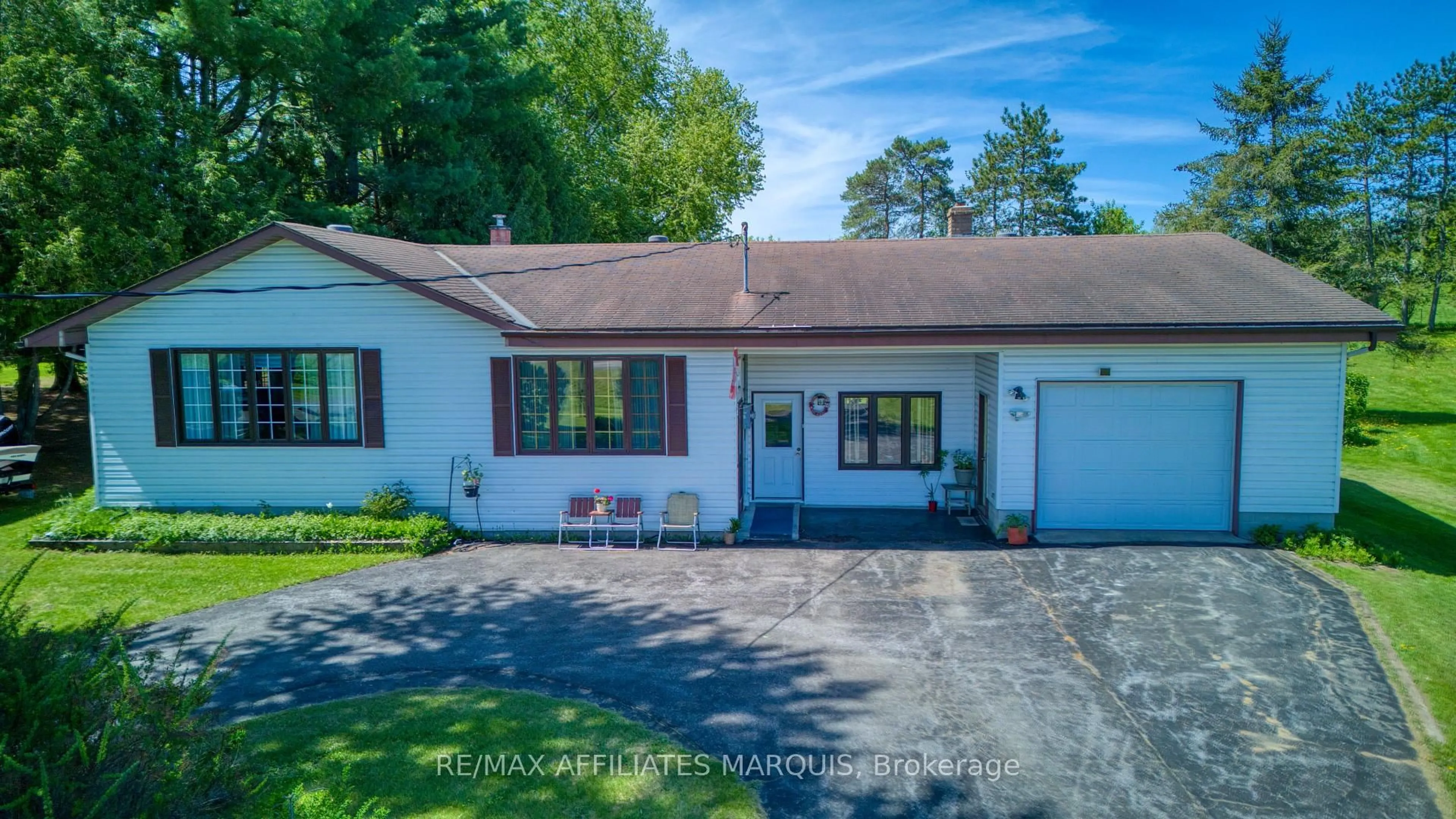 A pic from outside/outdoor area/front of a property/back of a property/a pic from drone, street for 9851 Highway 42 Highway, Rideau Lakes Ontario K0G 1X0